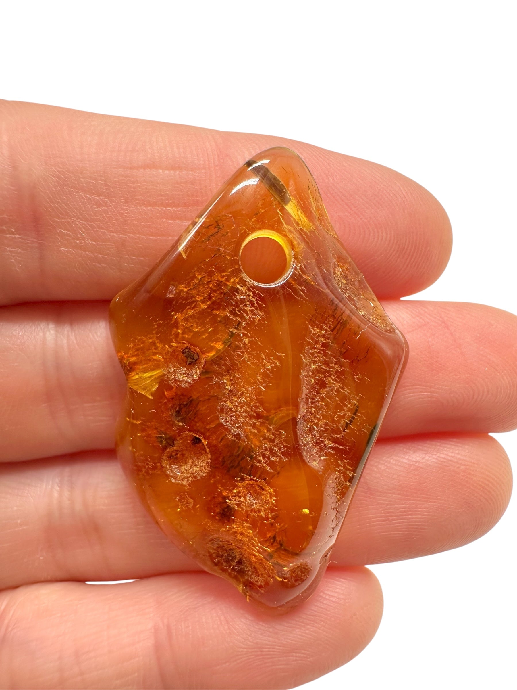 Amber with a drilled hole for hanging 3,9g – Lithuania - JND56