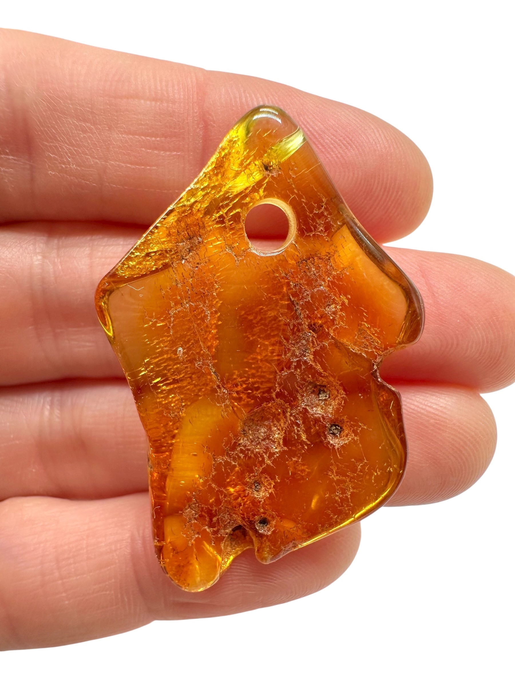 Amber with a drilled hole for hanging 3,9g – Lithuania