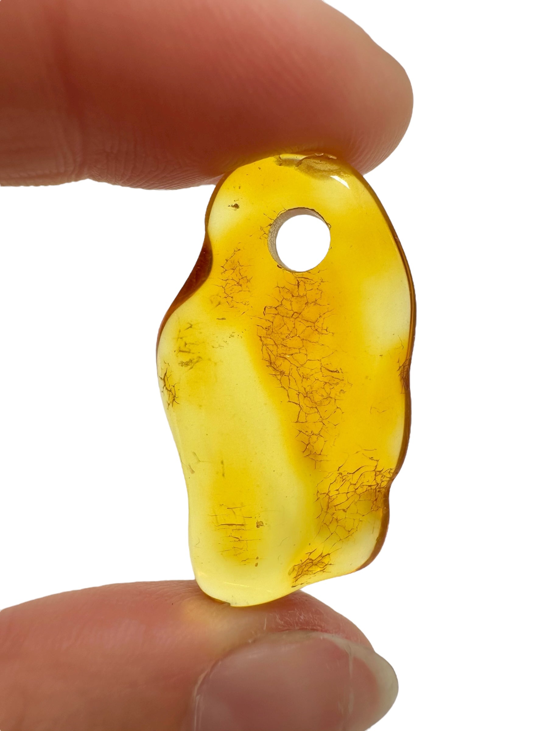 Amber with a drilled hole for hanging 2,2g – Lithuania - JND58