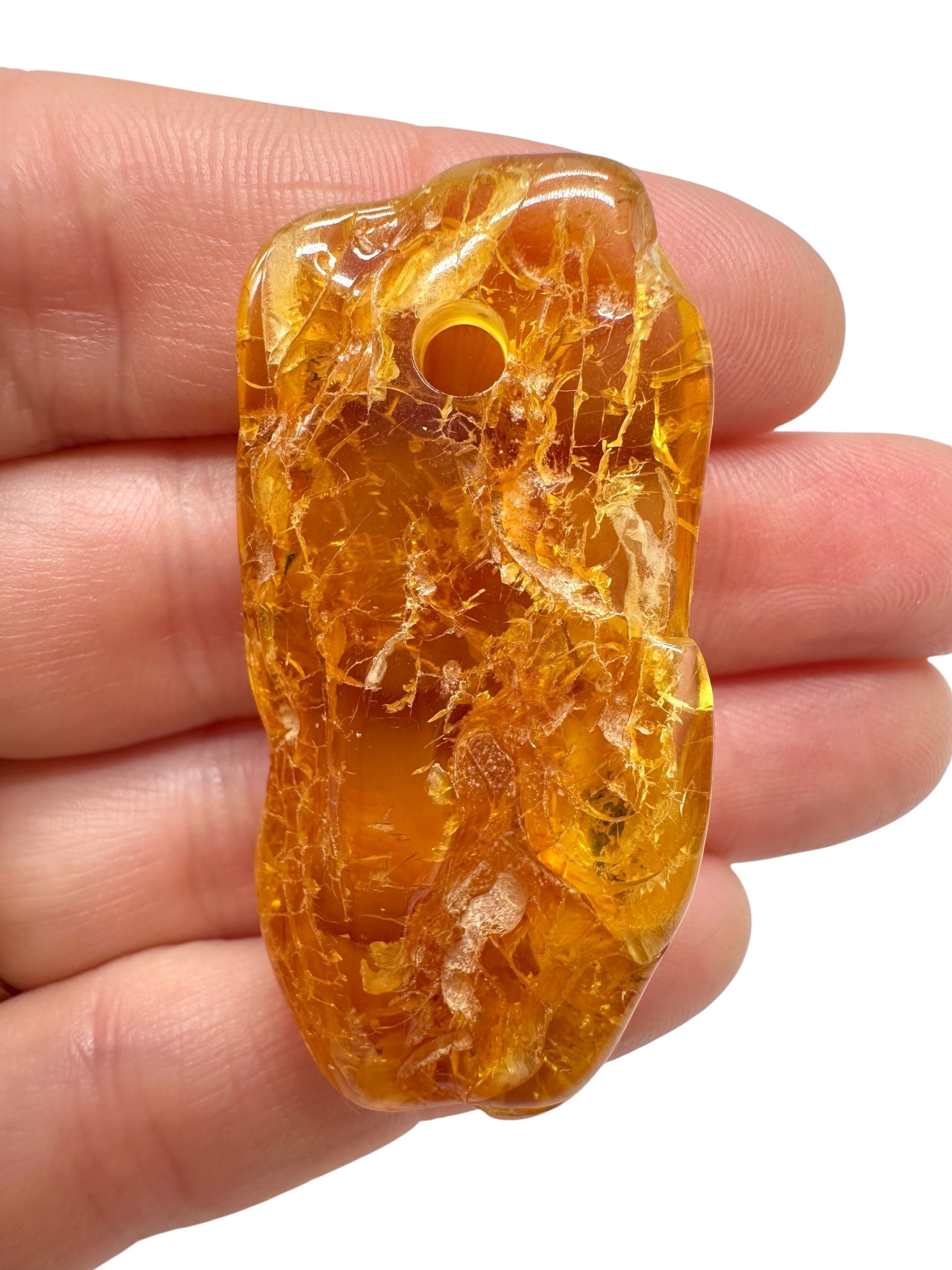 Amber with a drilled hole for hanging 5,3g – Lithuania