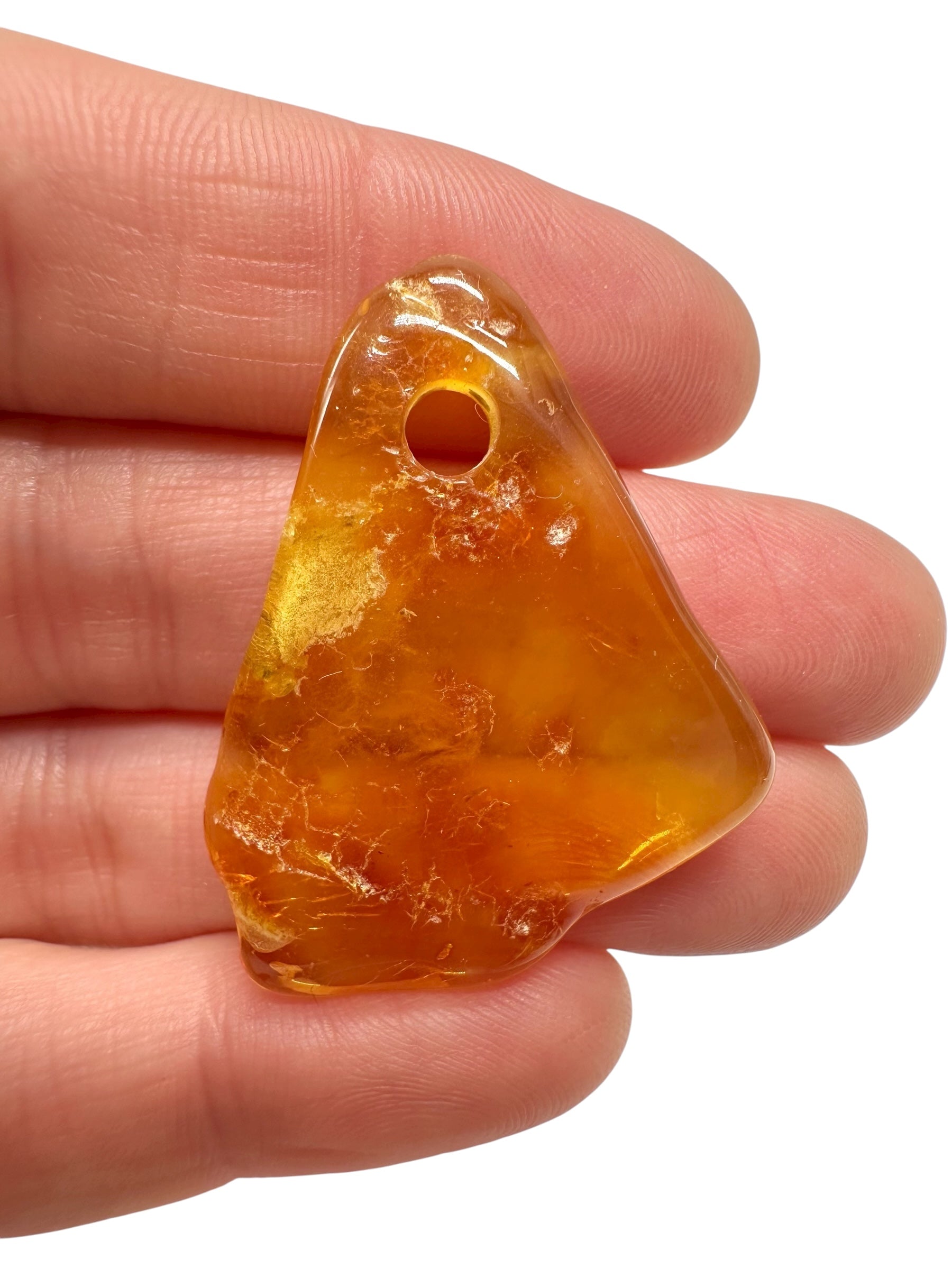 Amber with a drilled hole for hanging 2,8g – Lithuania