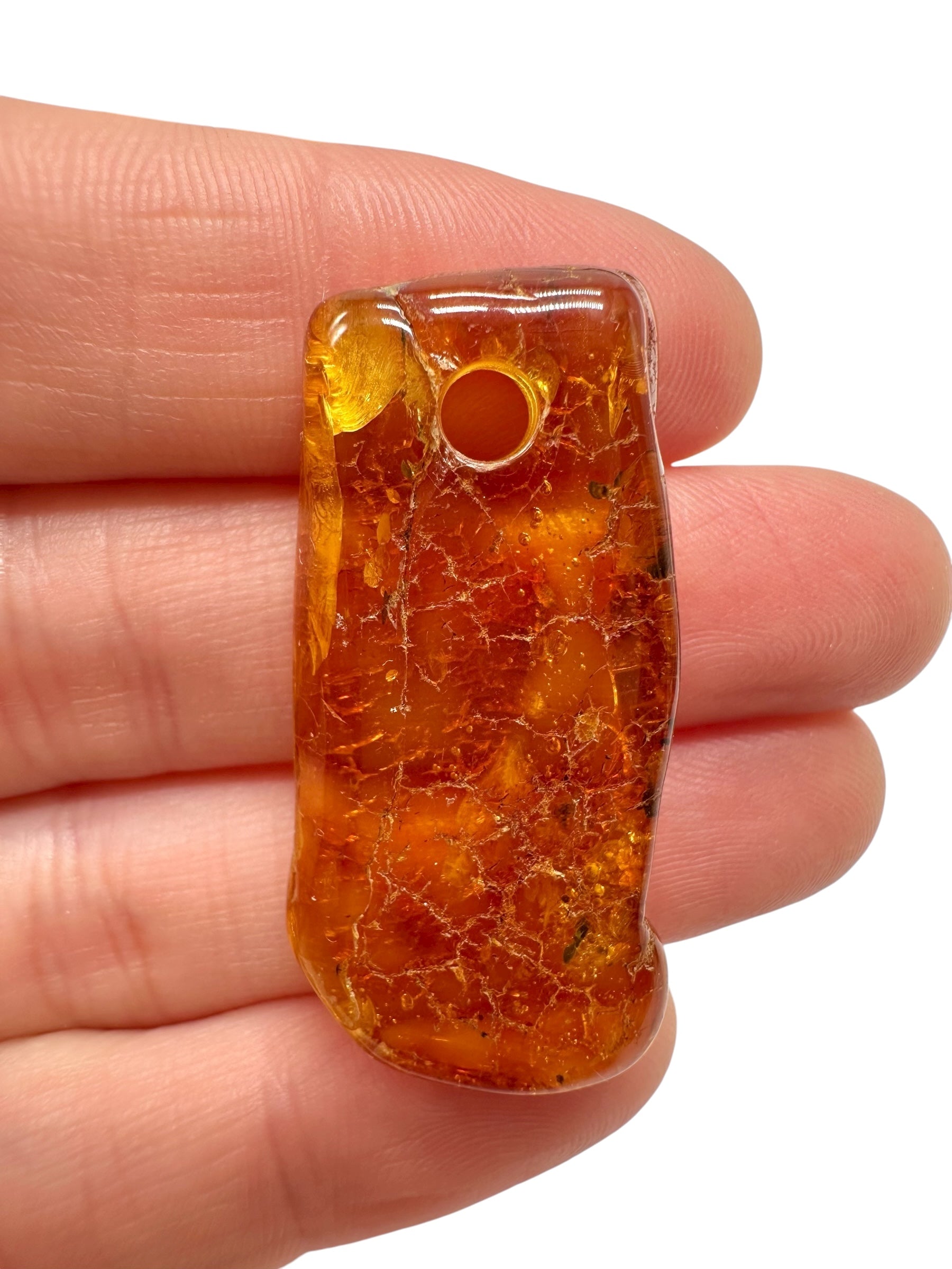 Amber with a drilled hole for hanging 3,1g – Lithuania