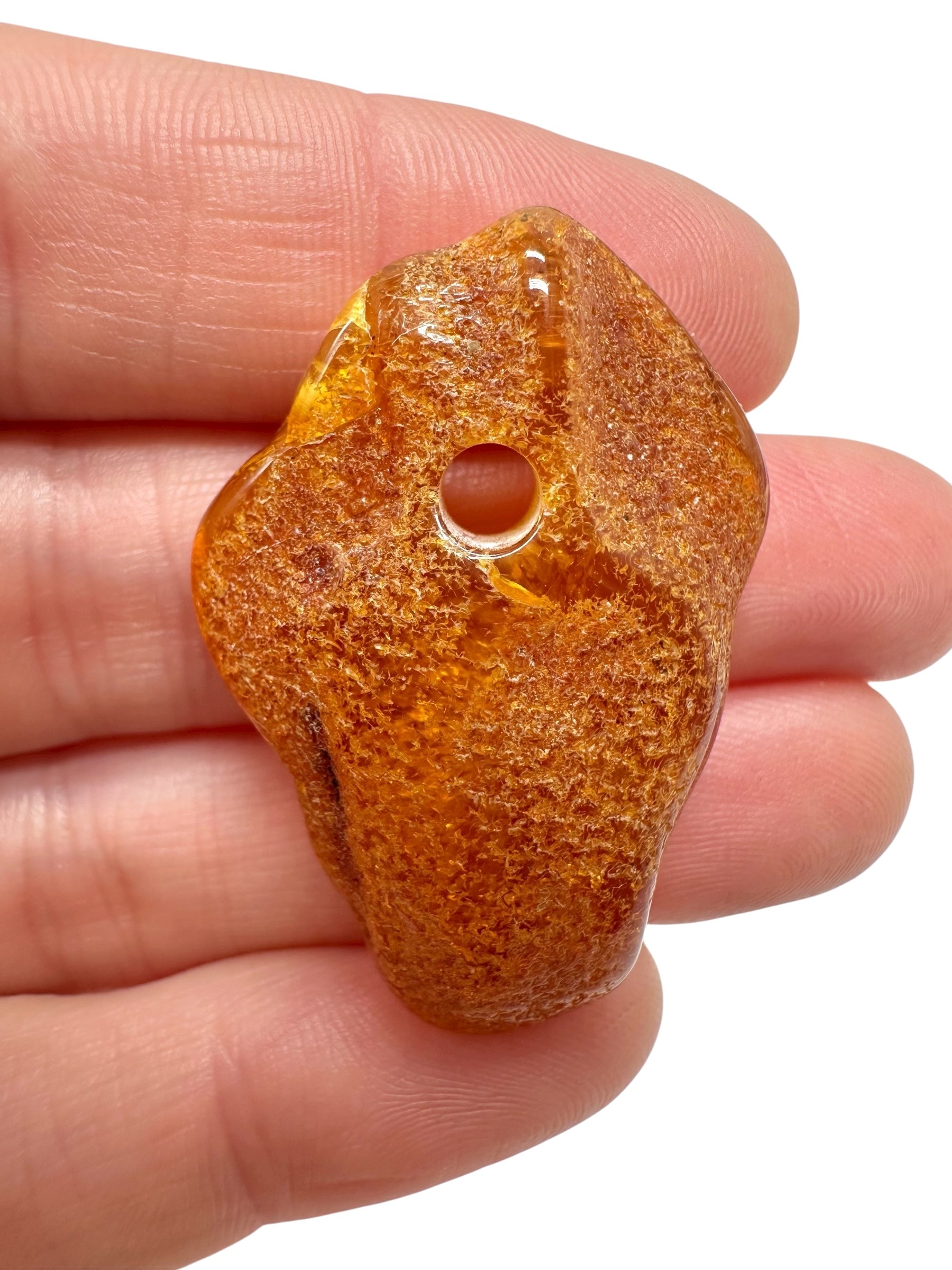 Amber with a drilled hole for hanging 3g – Lithuania