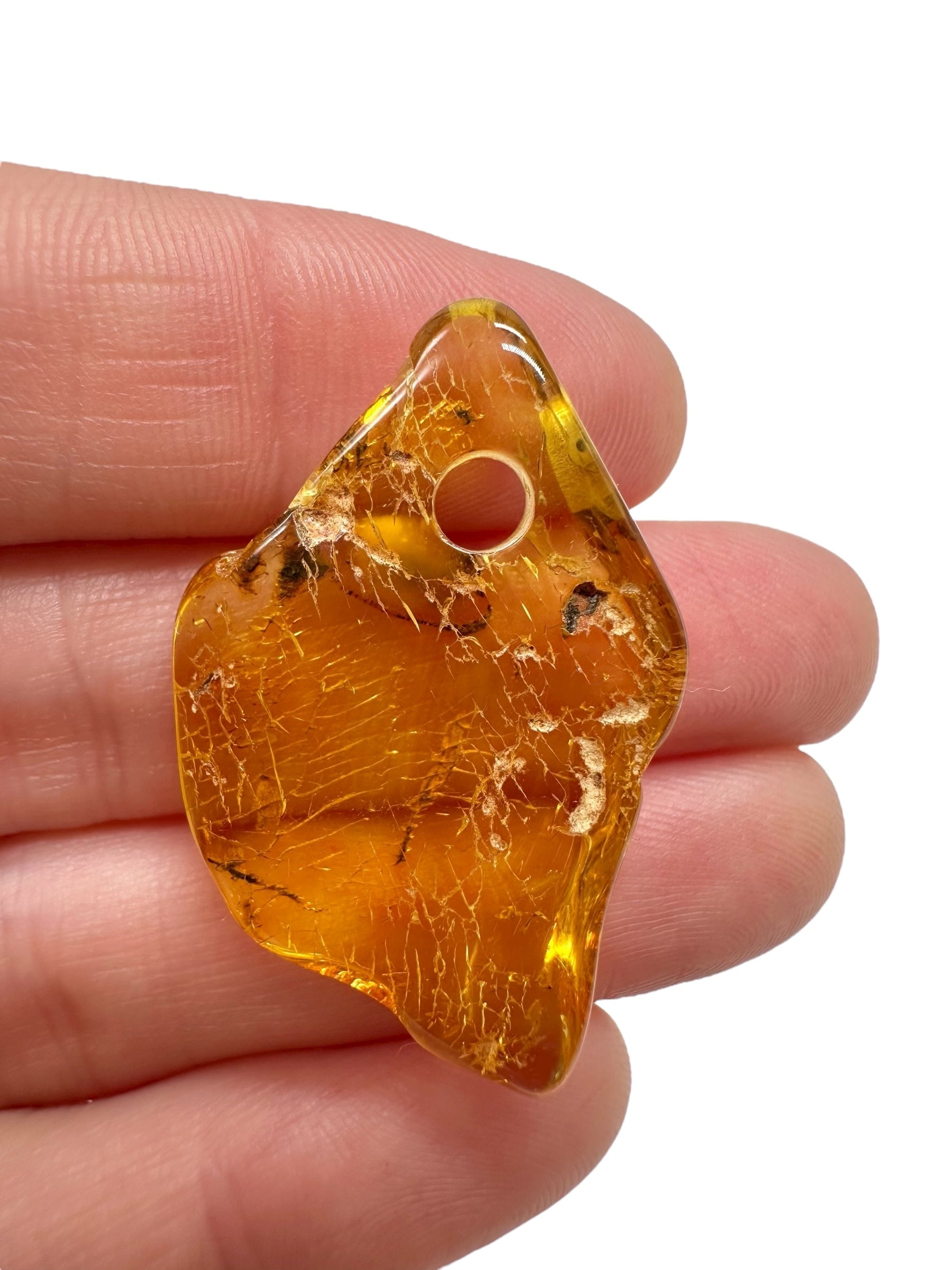 Amber with a drilled hole for hanging 2,4g – Lithuania - JND65