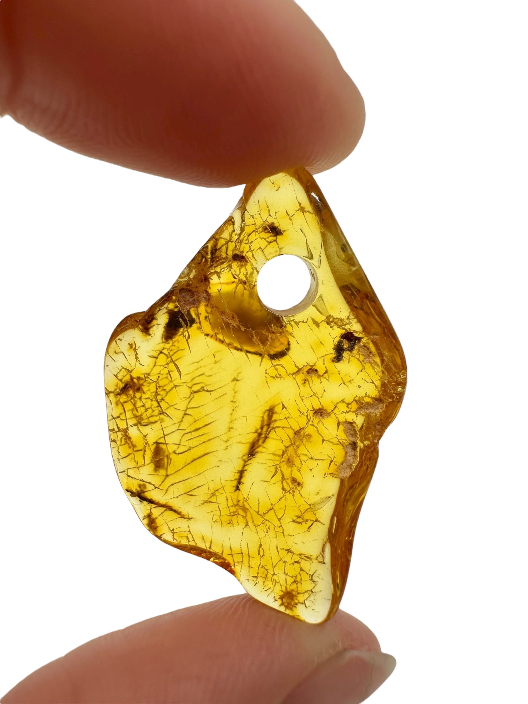 Amber with a drilled hole for hanging 2,4g – Lithuania - JND65