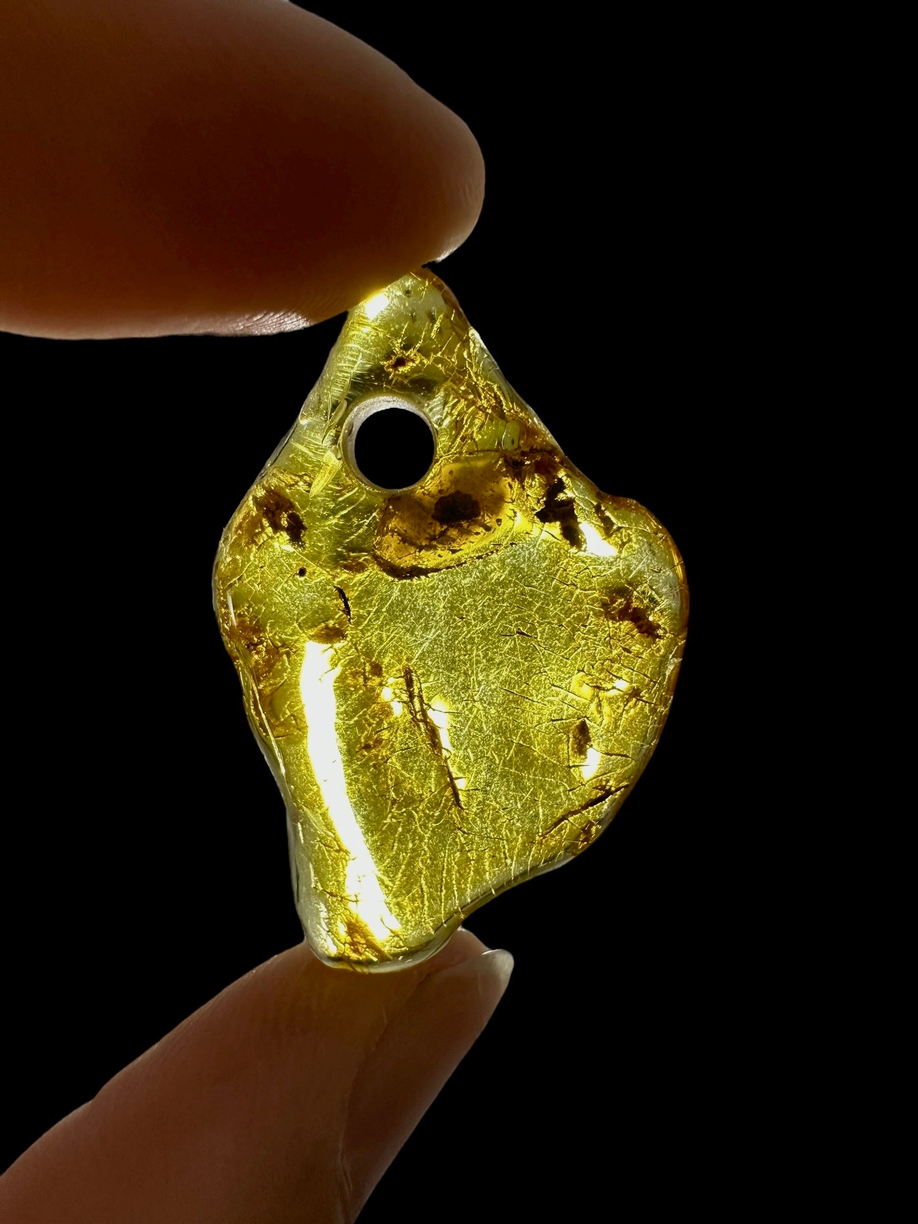 Amber with a drilled hole for hanging 2,4g – Lithuania - JND65