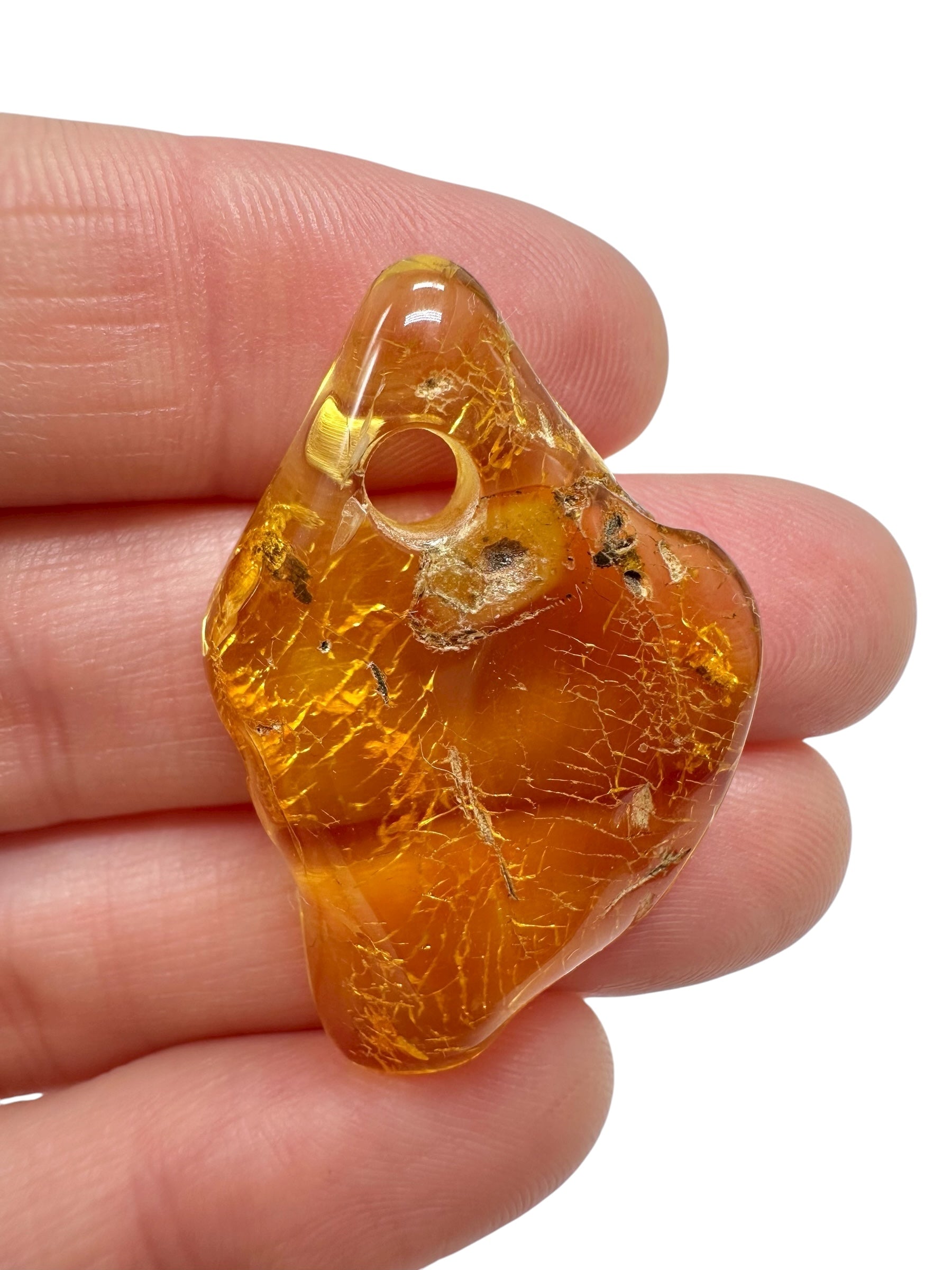 Amber with a drilled hole for hanging 2,4g – Lithuania