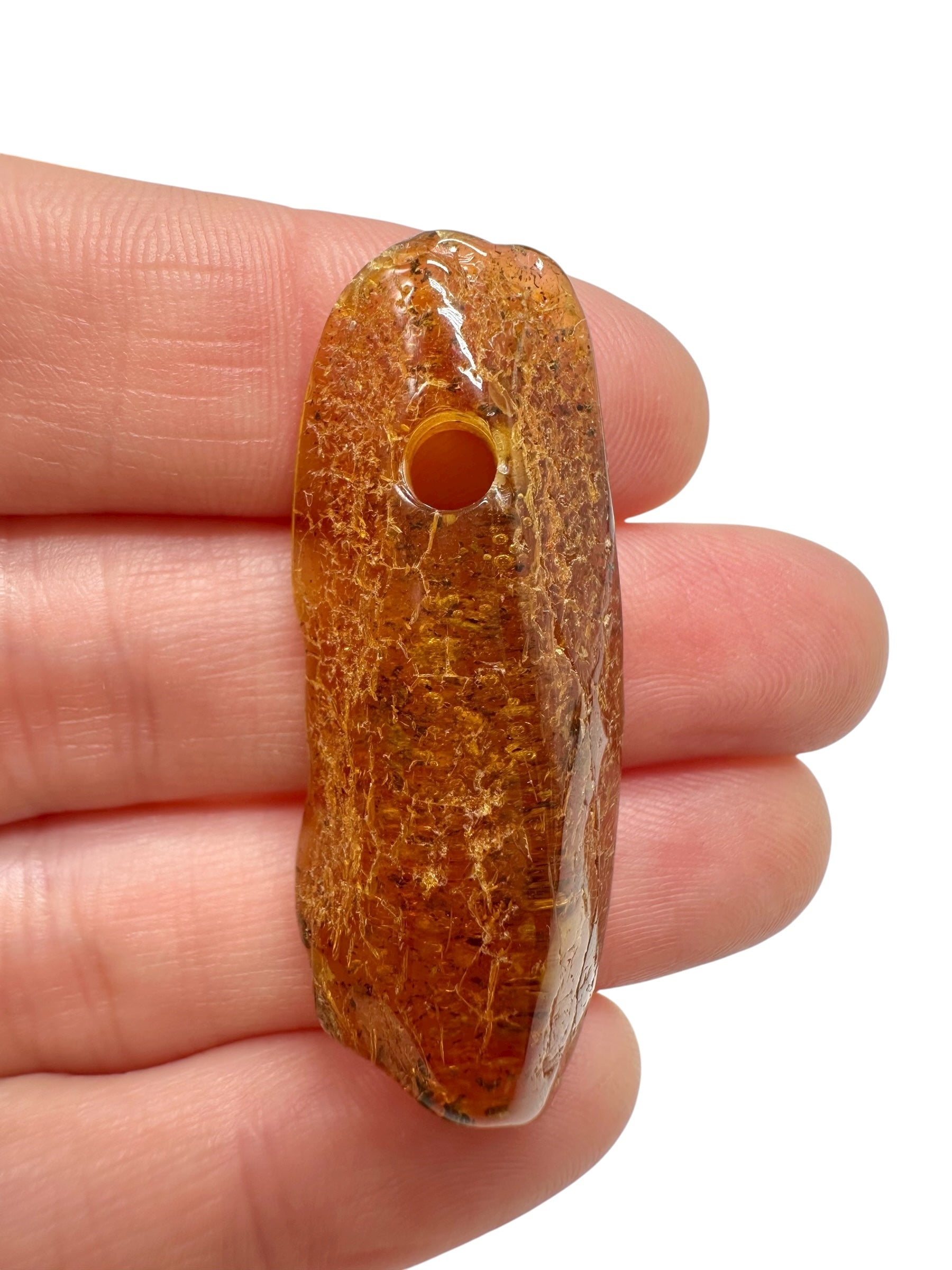 Amber with a drilled hole for hanging 3,1g – Lithuania