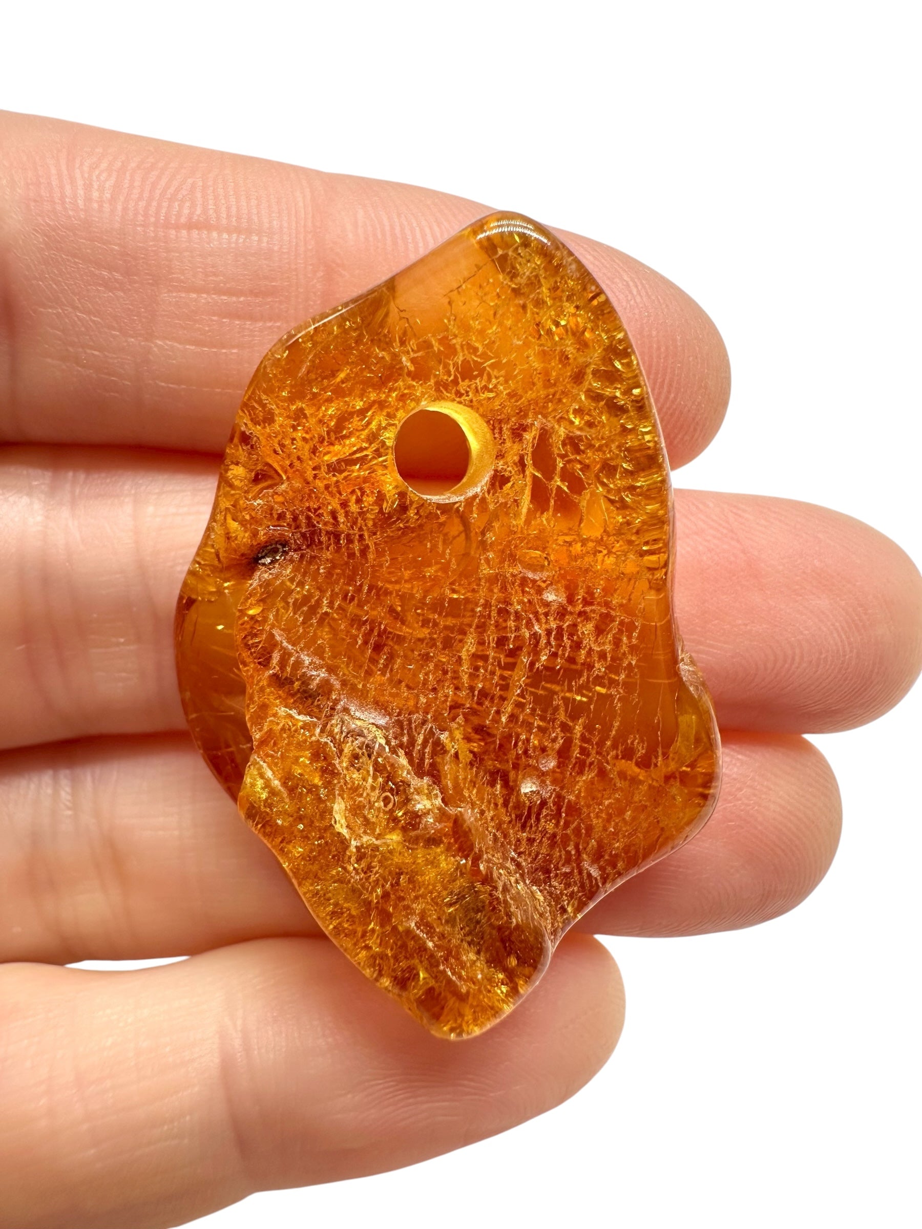 Amber with a drilled hole for hanging 3,7g – Lithuania - JND71