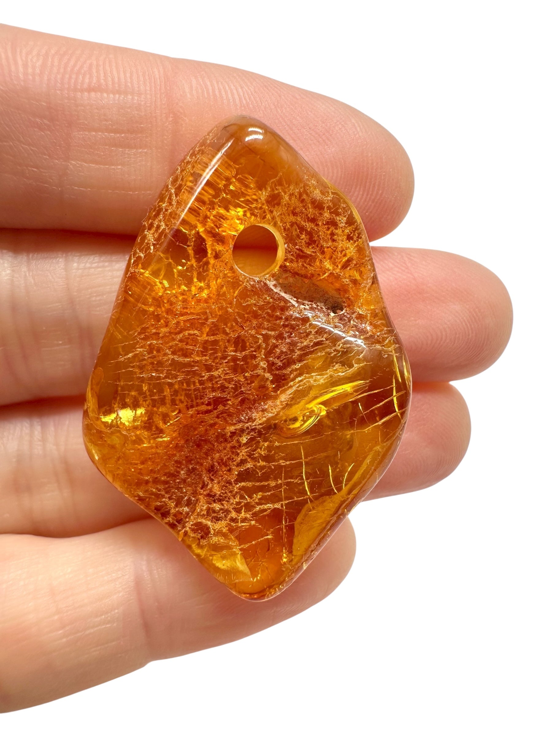 Amber with a drilled hole for hanging 3,7g – Lithuania