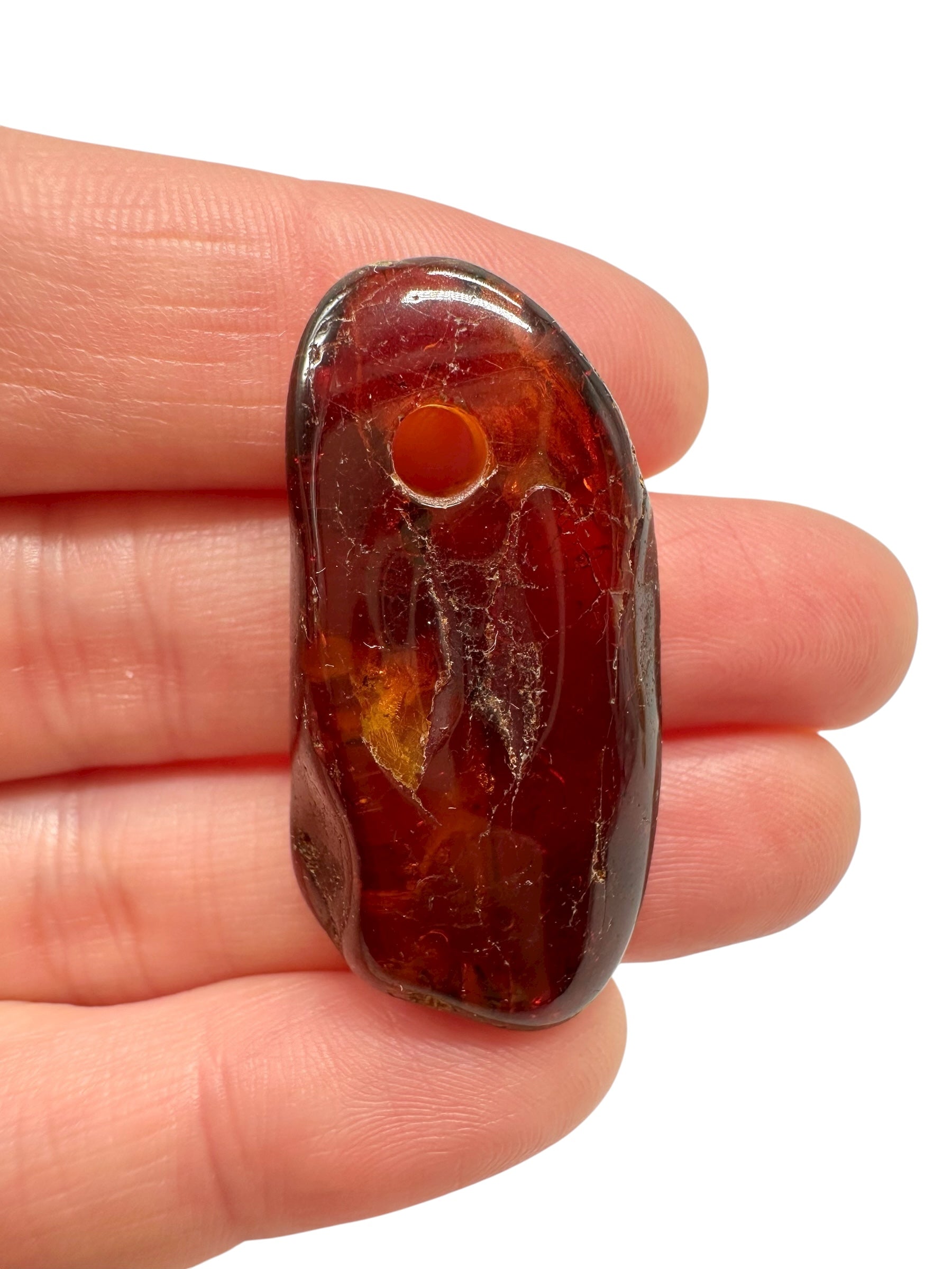 Amber with a drilled hole for hanging 3,7g – Lithuania