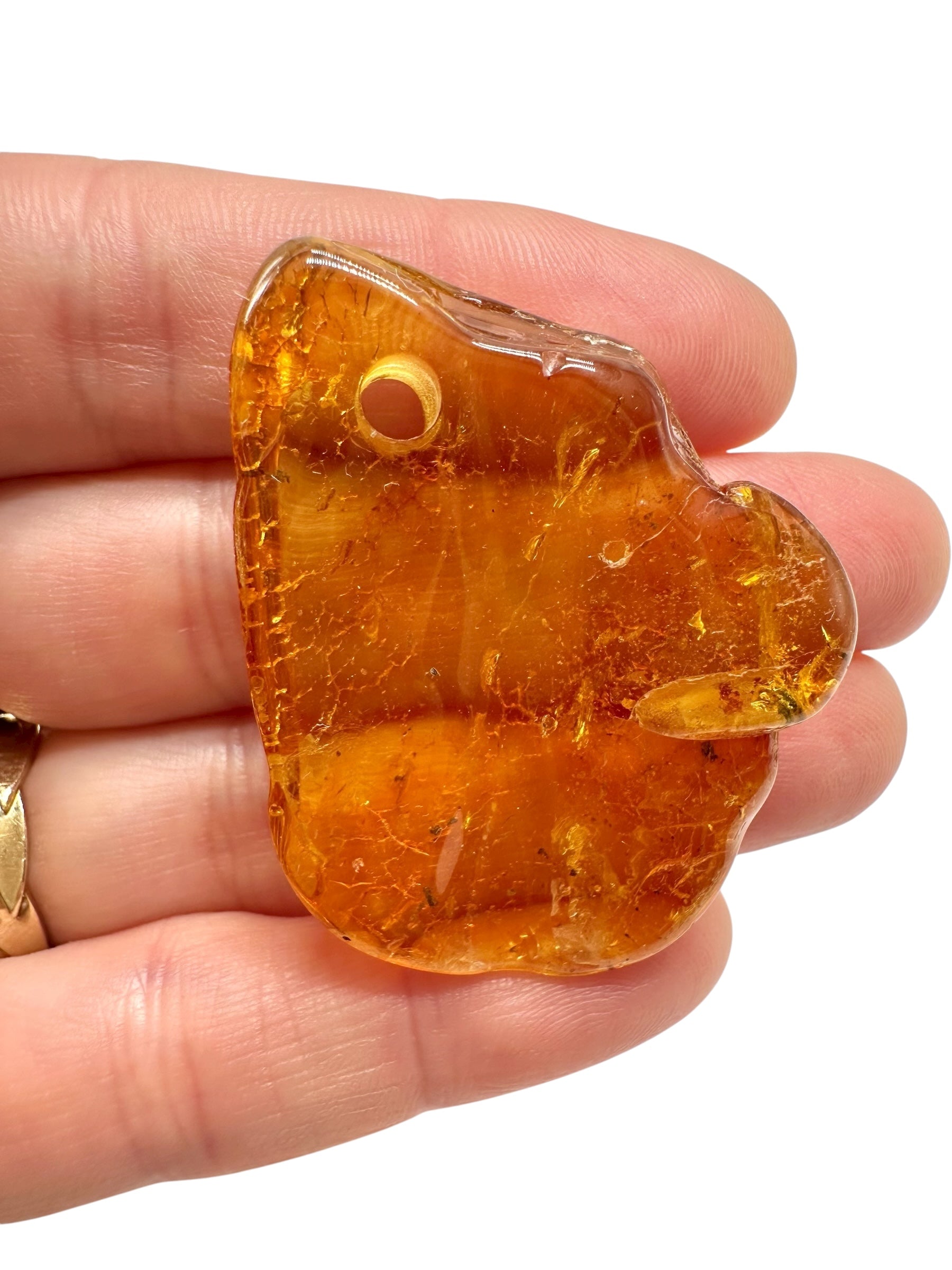 Amber with a drilled hole for hanging 6g – Lithuania