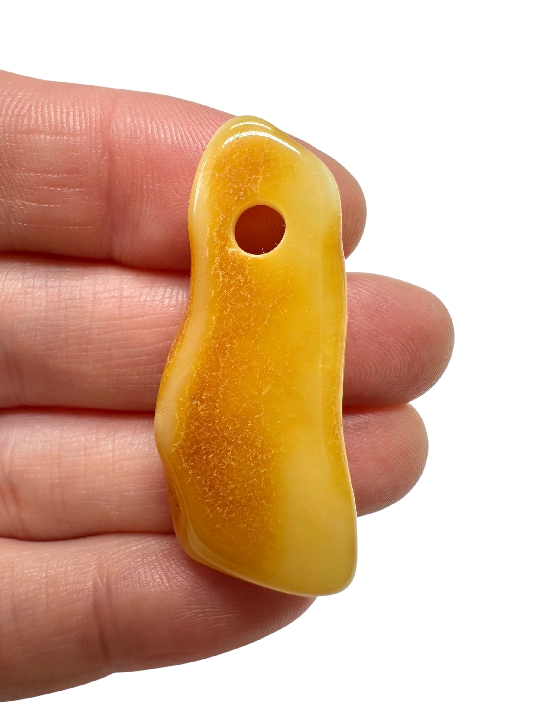 Amber with a drilled hole for hanging 2,4g – Lithuania