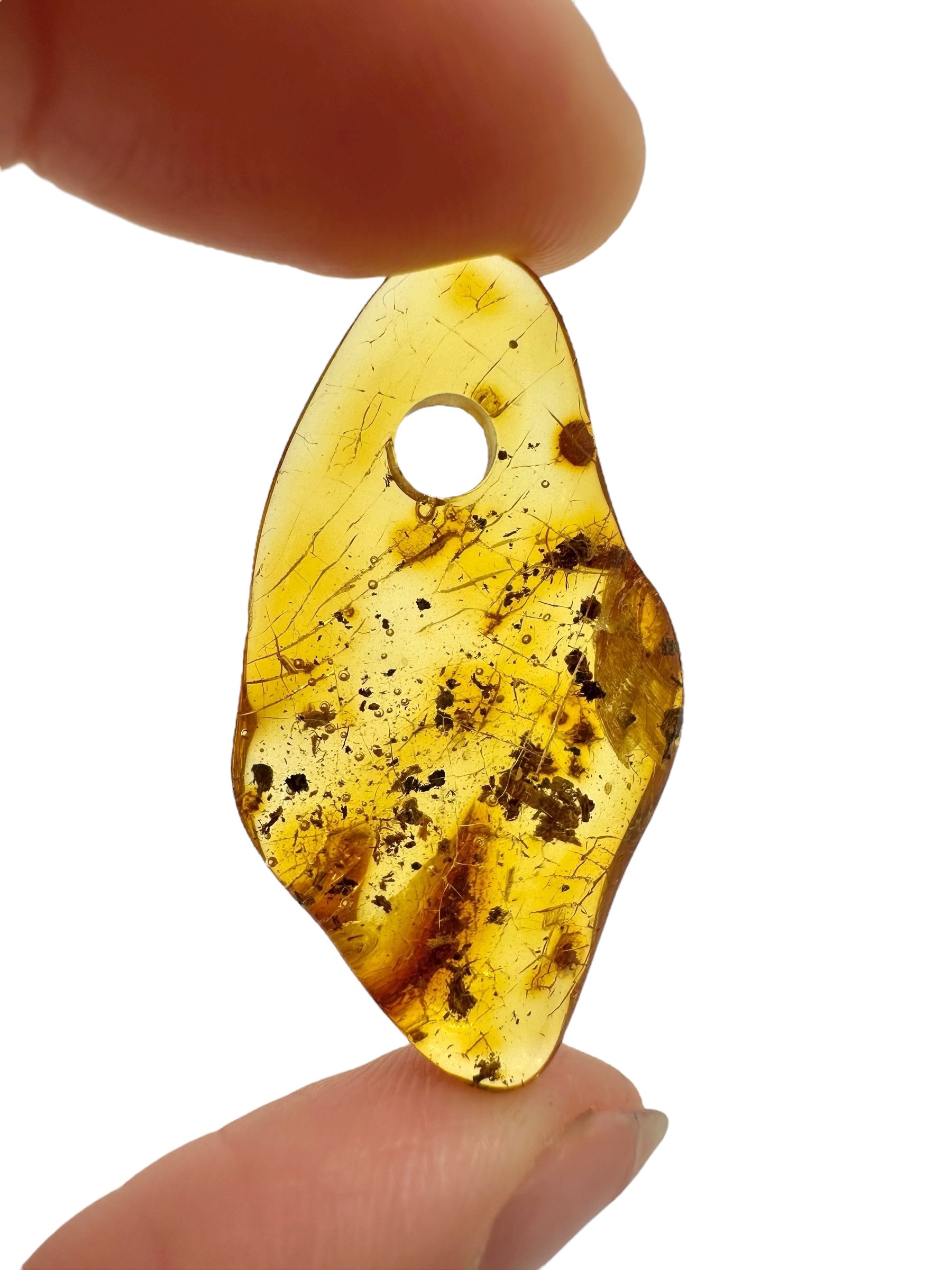 Amber with a drilled hole for hanging 2g – Lithuania - JND79