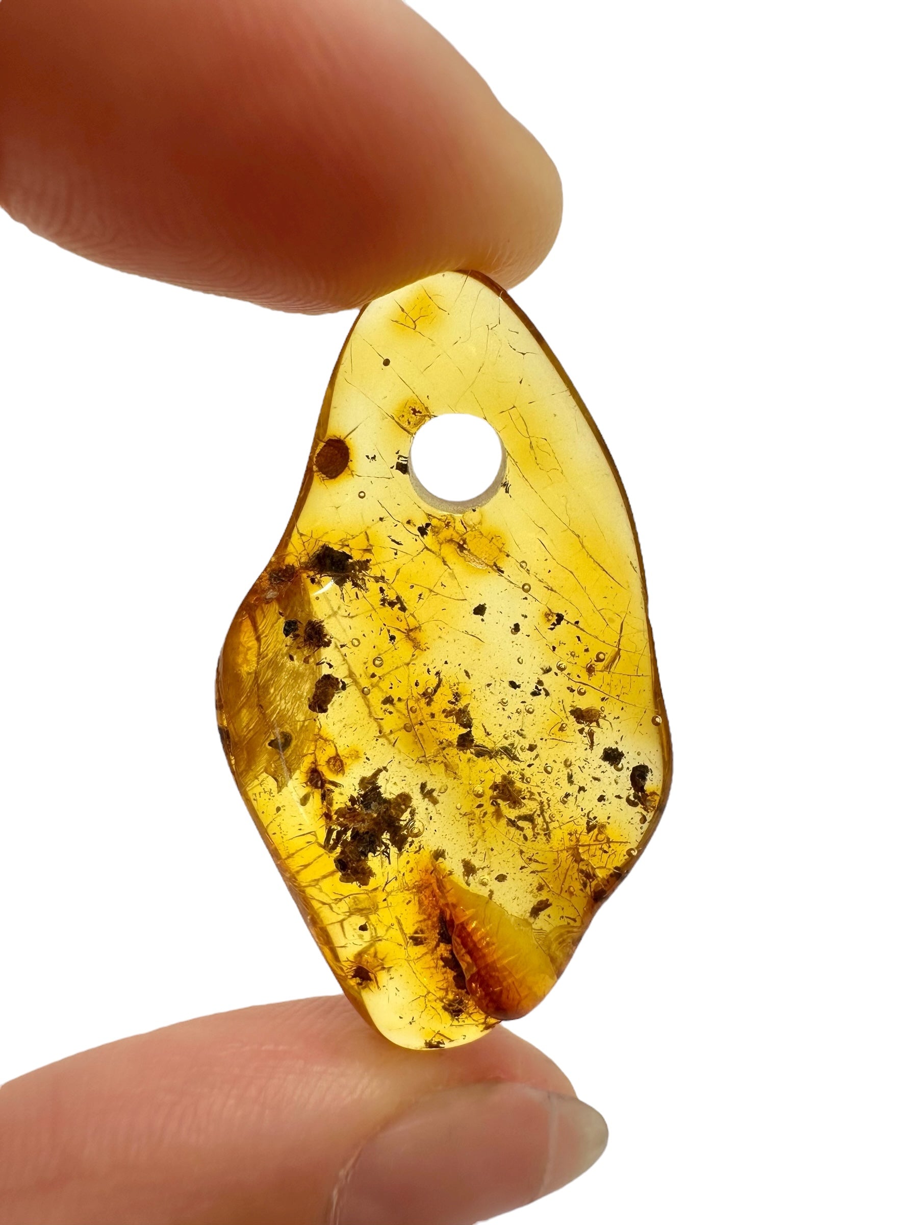 Amber with a drilled hole for hanging 2g – Lithuania - JND79
