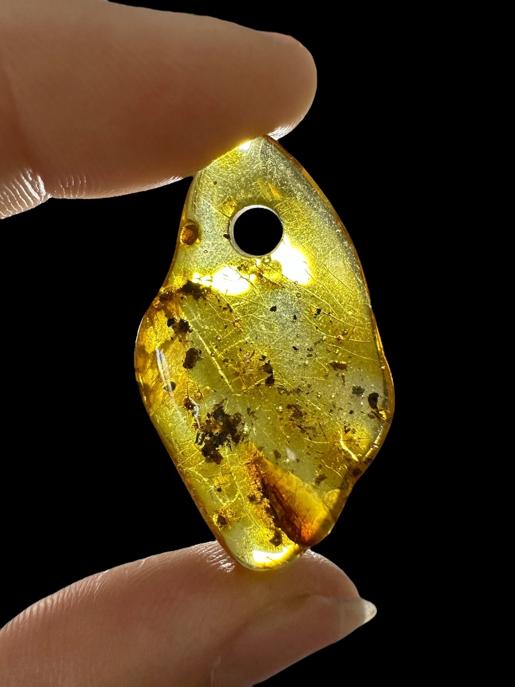 Amber with a drilled hole for hanging 2g – Lithuania - JND79