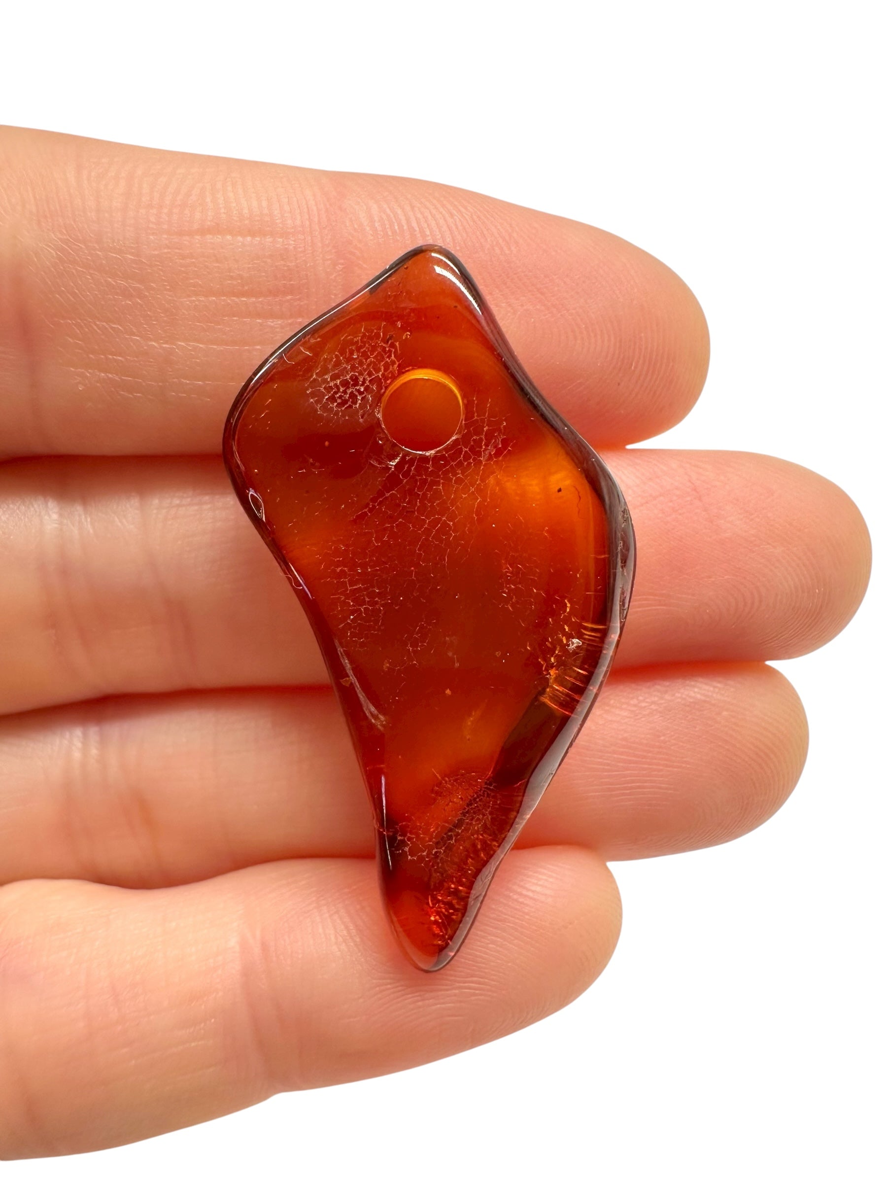 Amber with a drilled hole for hanging 2,3g – Lithuania - JND81