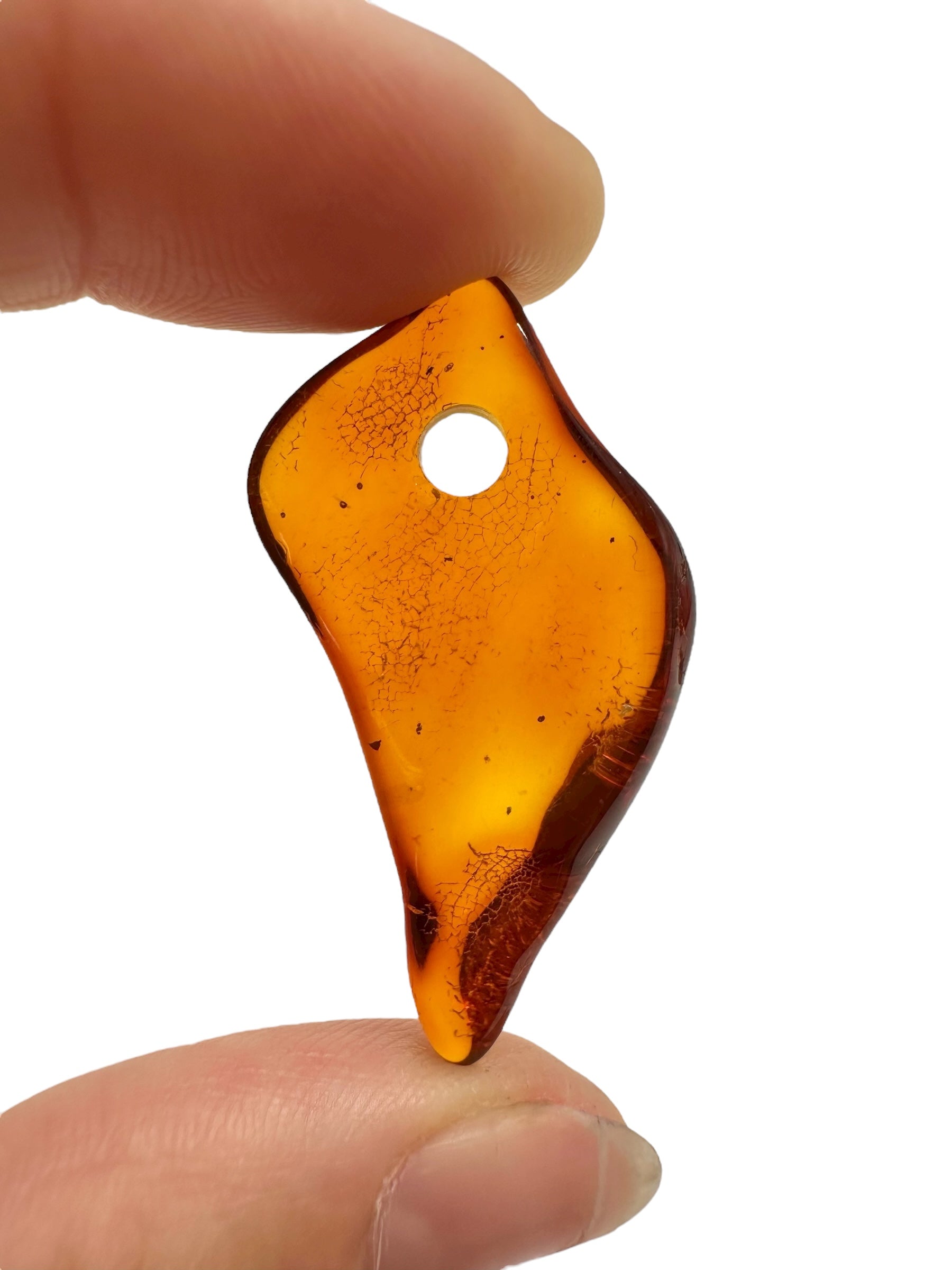 Amber with a drilled hole for hanging 2,3g – Lithuania - JND81