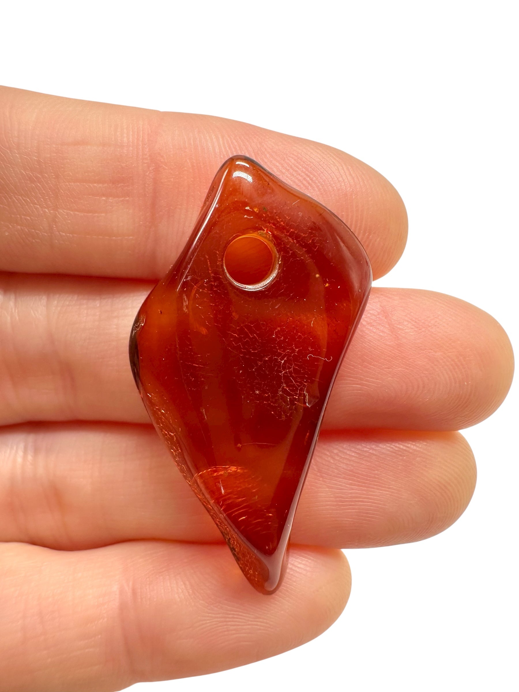 Amber with a drilled hole for hanging 2,3g – Lithuania
