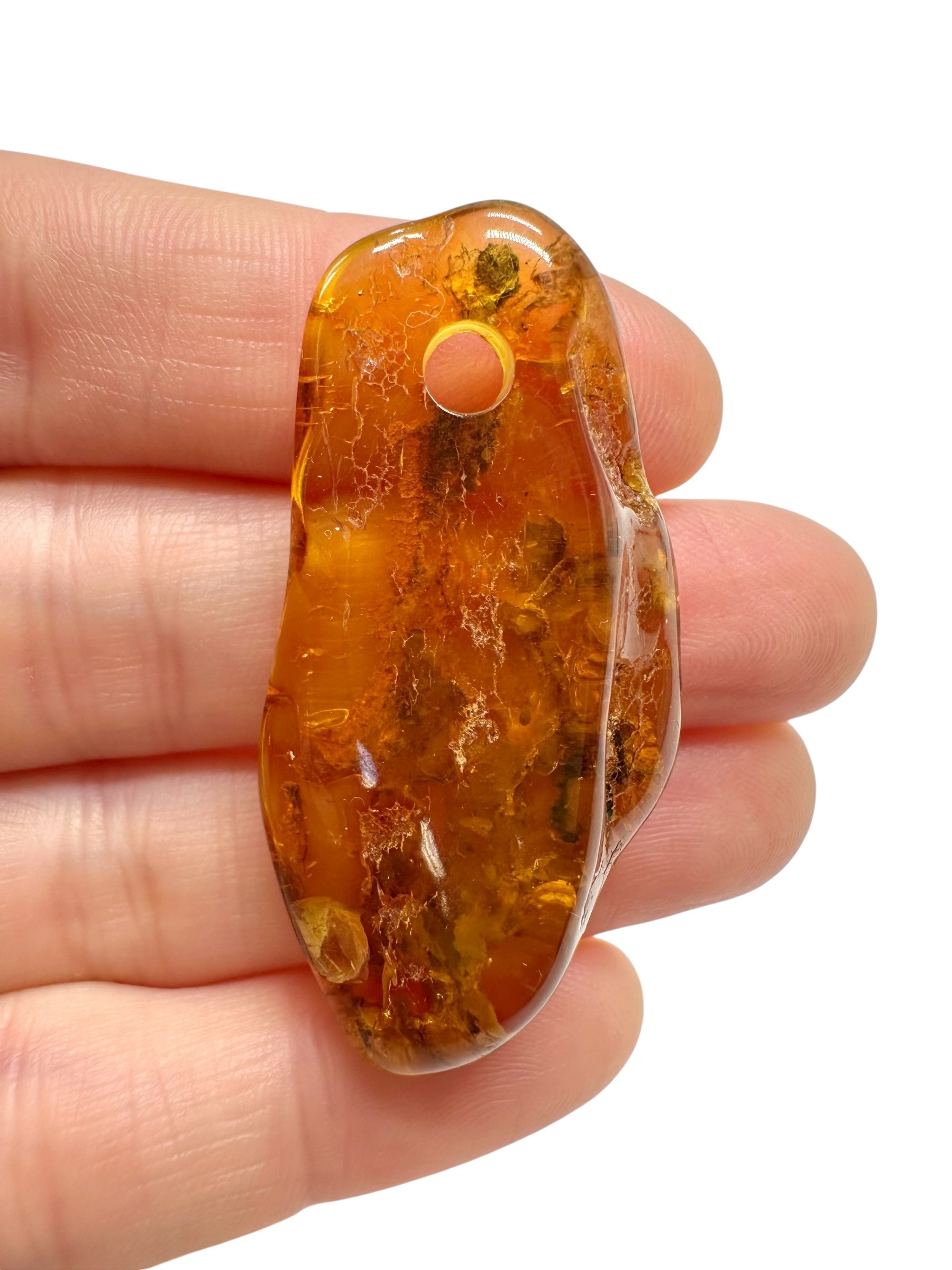Amber with a drilled hole for hanging 4,4g – Lithuania