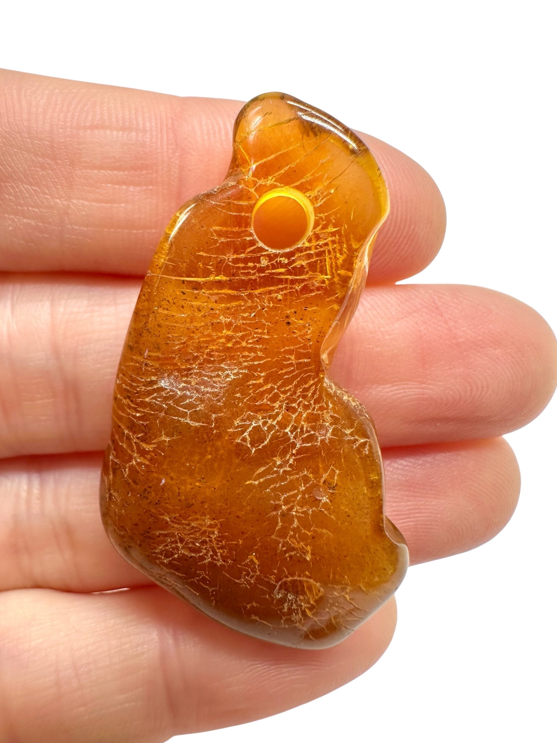 Amber with a drilled hole for hanging 3,7g – Lithuania