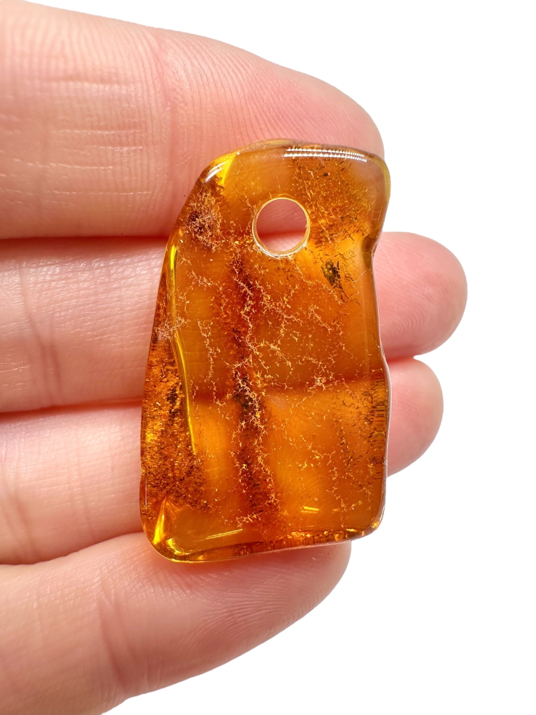 Amber with a drilled hole for hanging 3,2g – Lithuania - JND85
