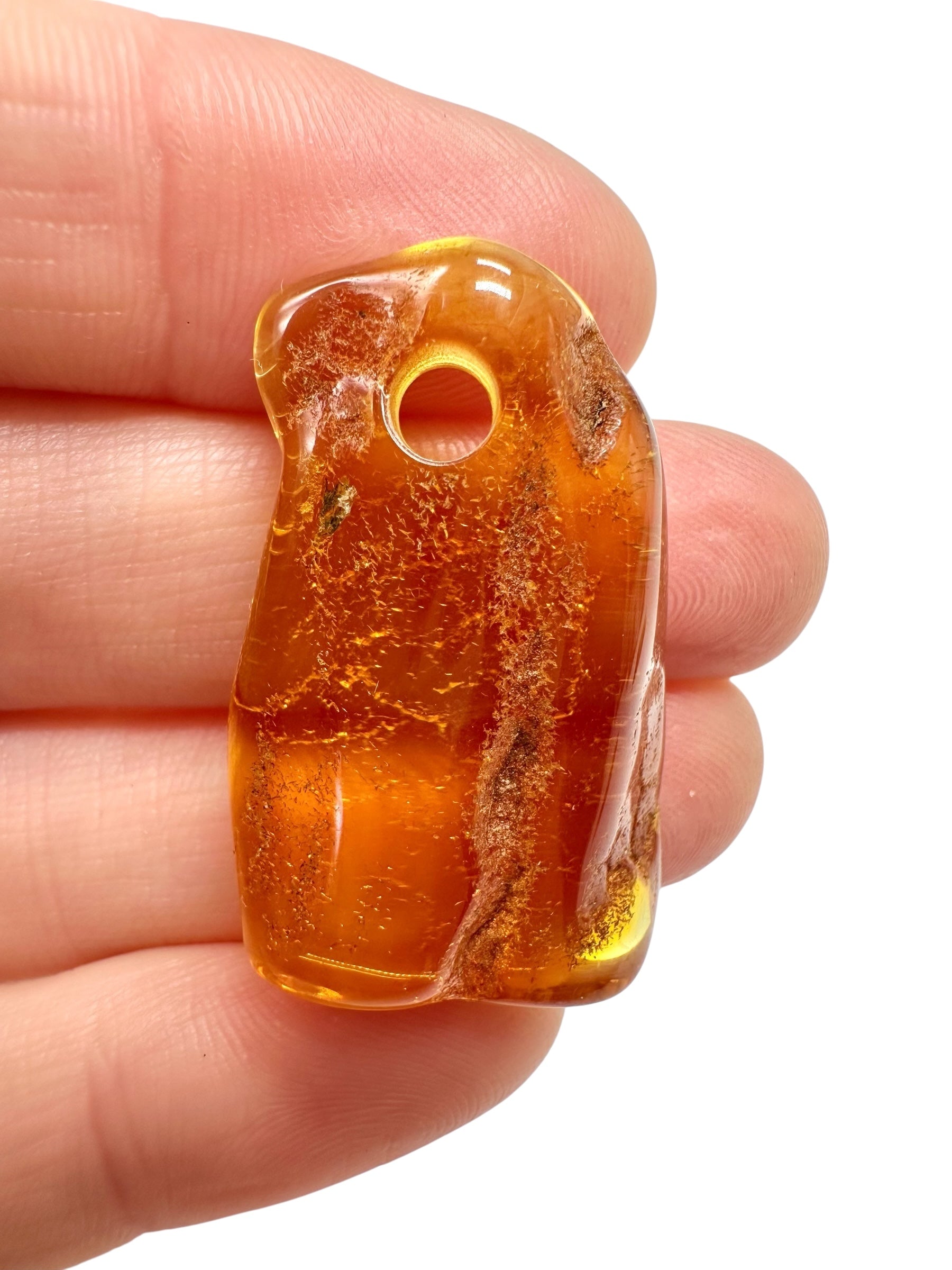 Amber with a drilled hole for hanging 3,2g – Lithuania