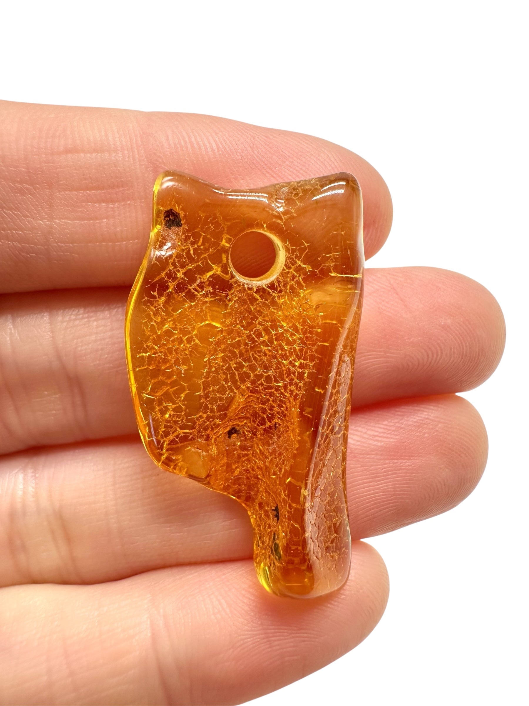 Amber with a drilled hole for hanging 2,5g – Lithuania