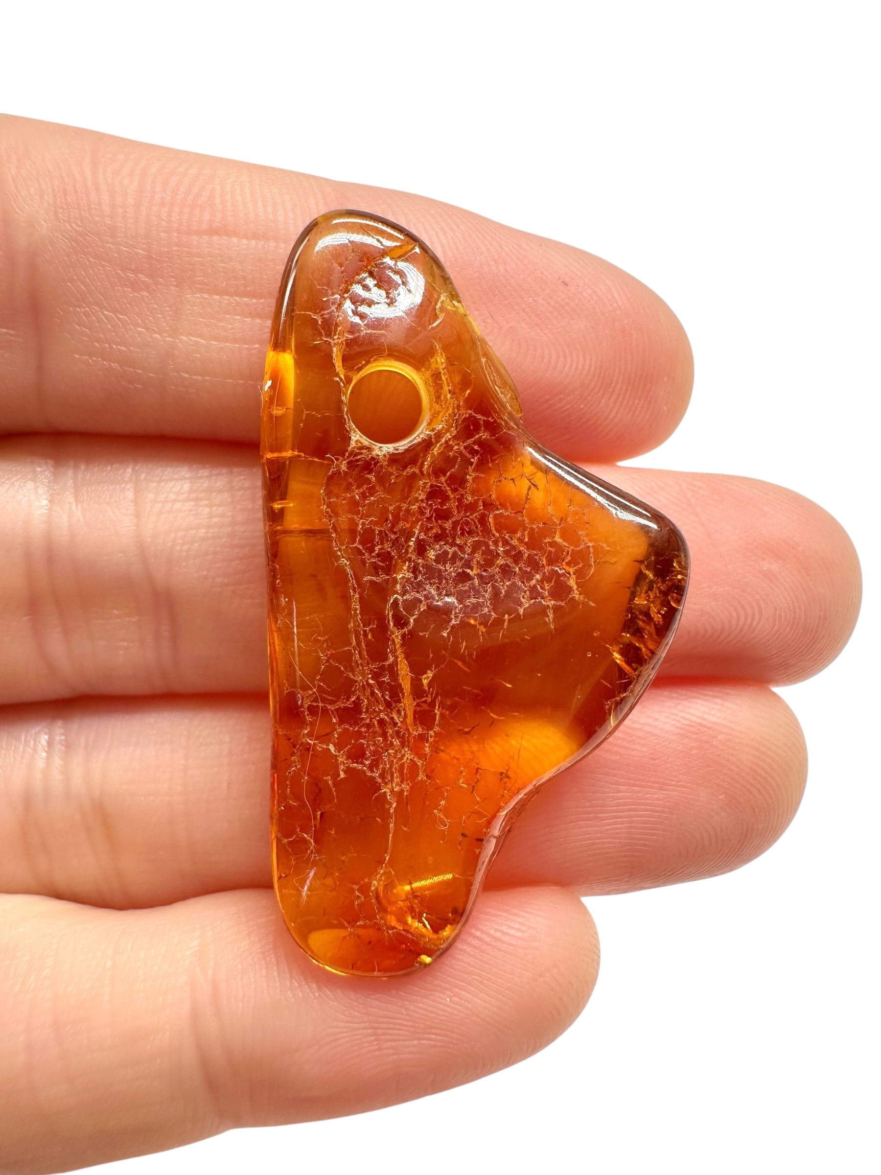 Amber with a drilled hole for hanging 2,7g – Lithuania - JND89