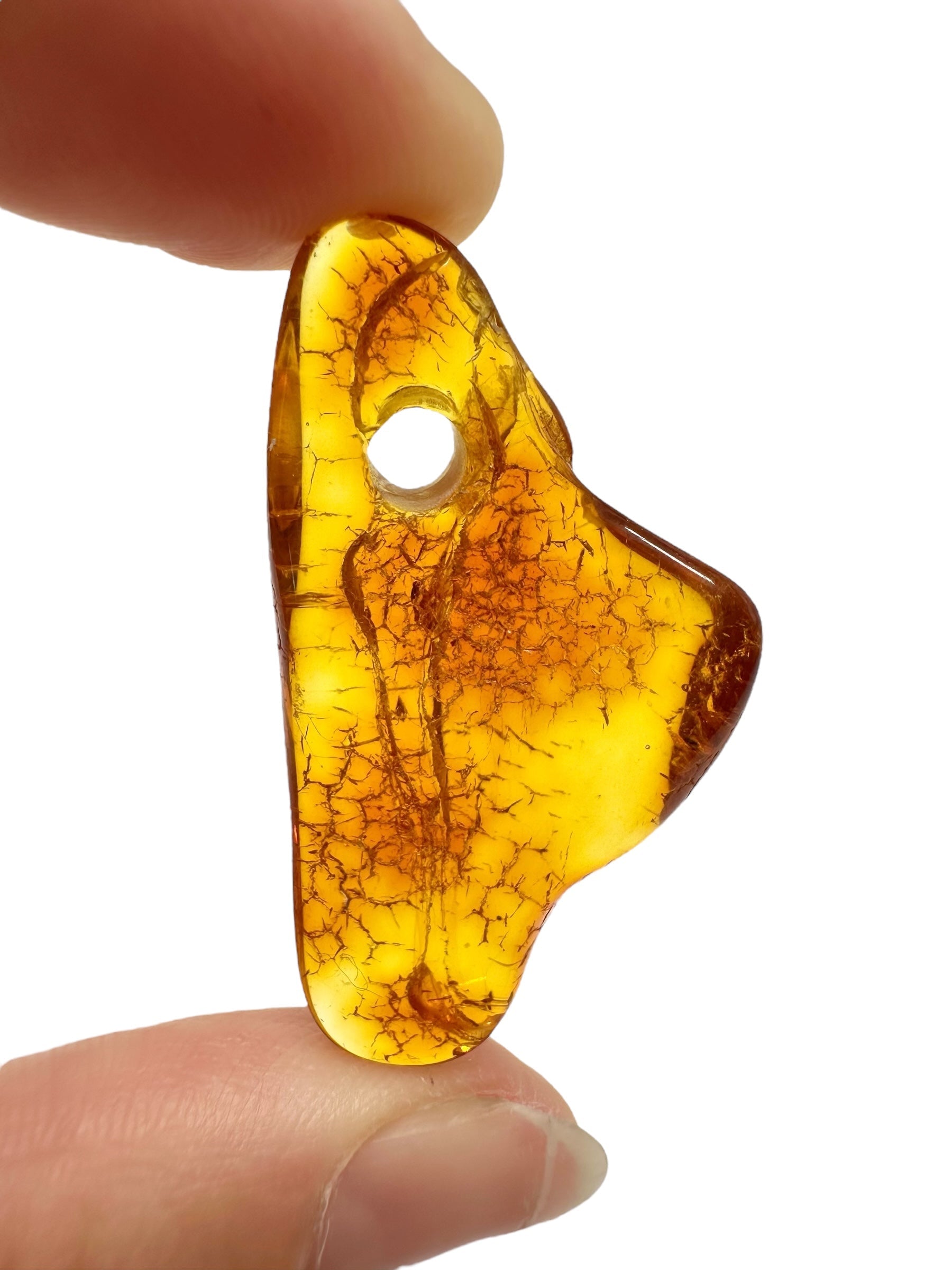 Amber with a drilled hole for hanging 2,7g – Lithuania - JND89