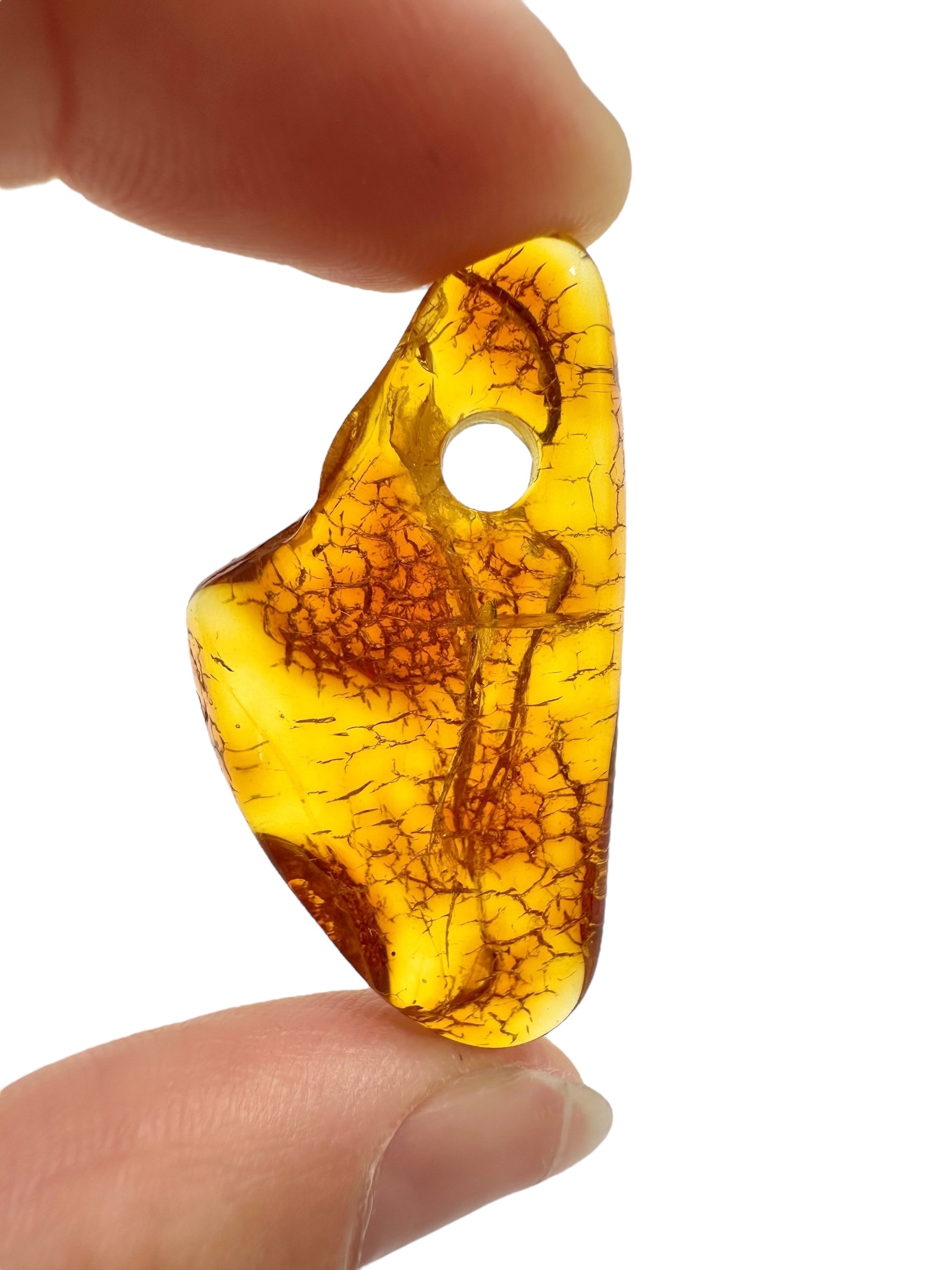 Amber with a drilled hole for hanging 2,7g – Lithuania - JND89