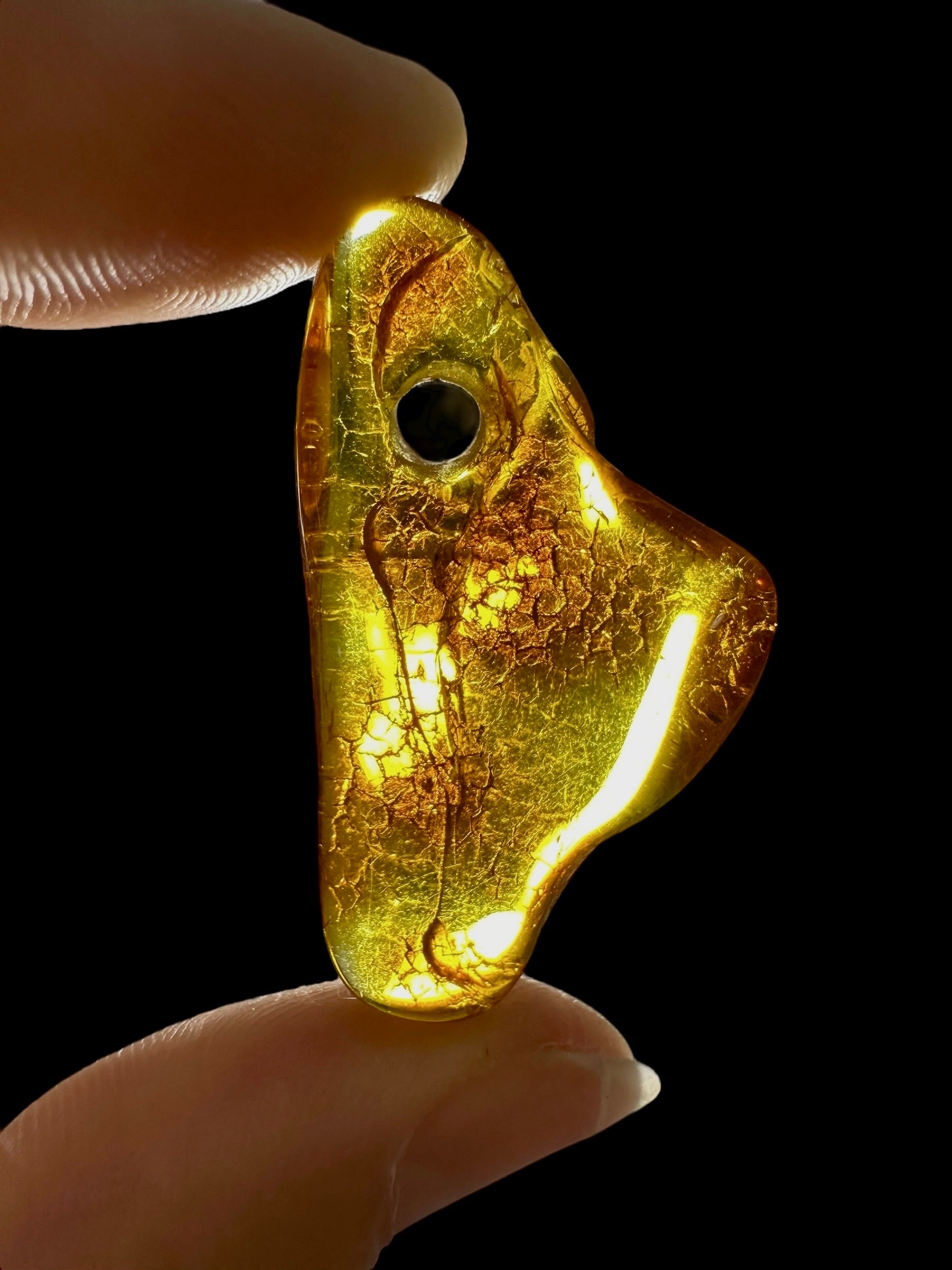 Amber with a drilled hole for hanging 2,7g – Lithuania - JND89