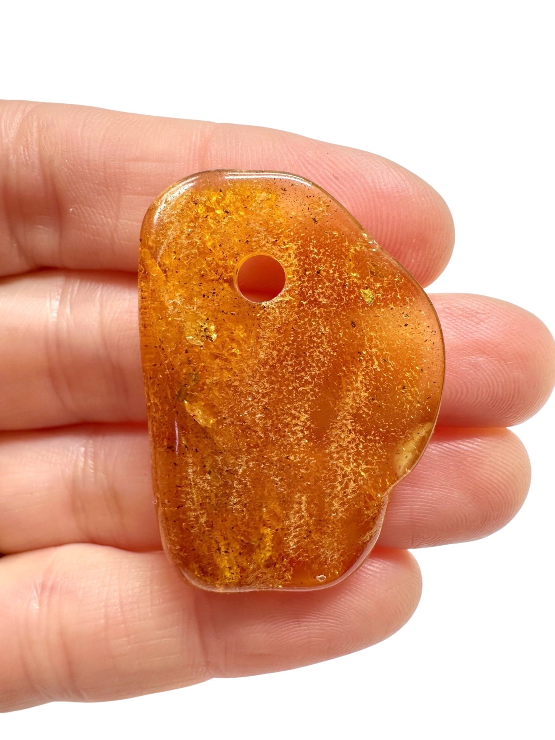 Amber with a drilled hole for hanging 3,2g – Lithuania - JND90