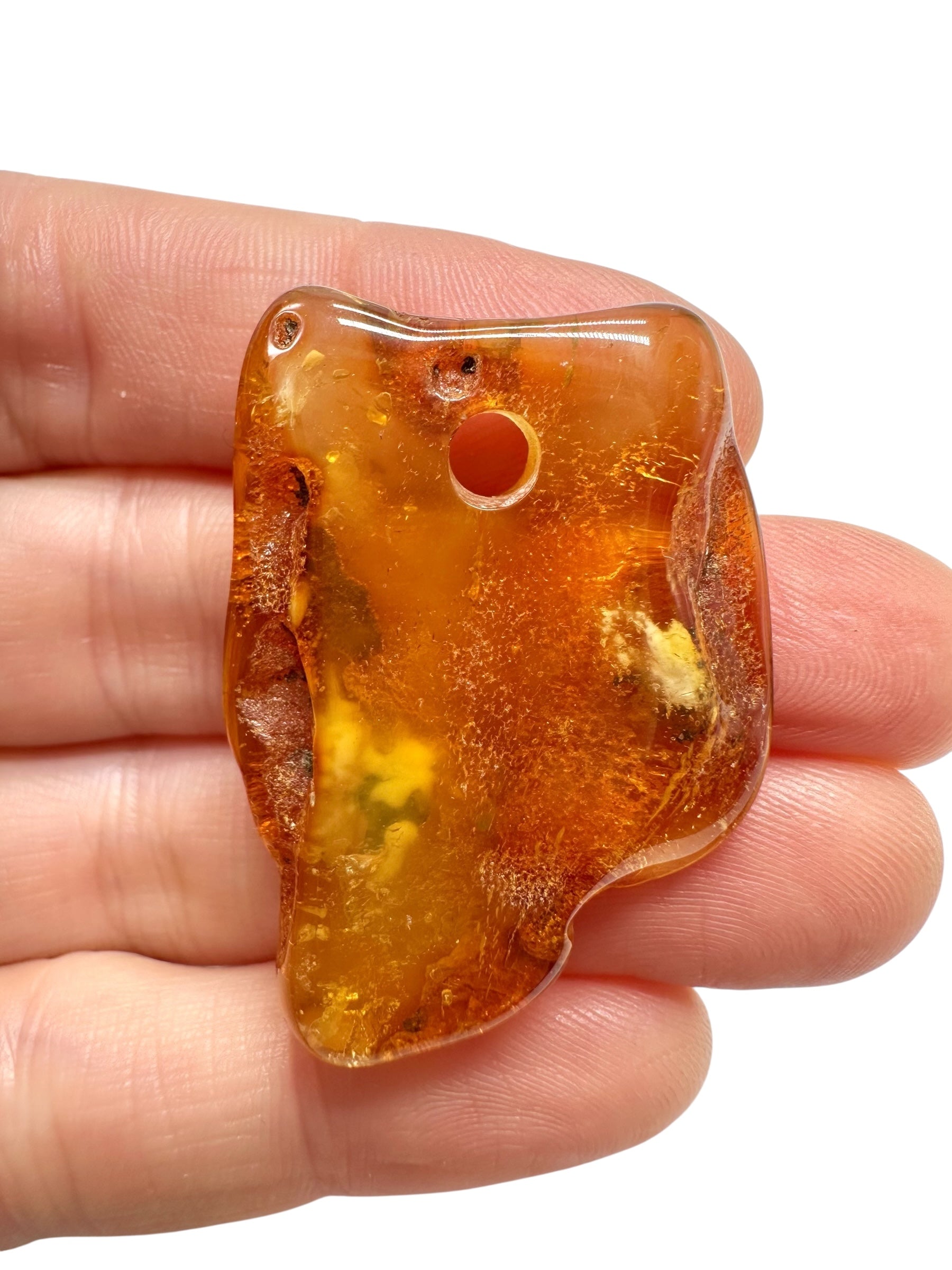 Amber with a drilled hole for hanging 4,4g – Lithuania