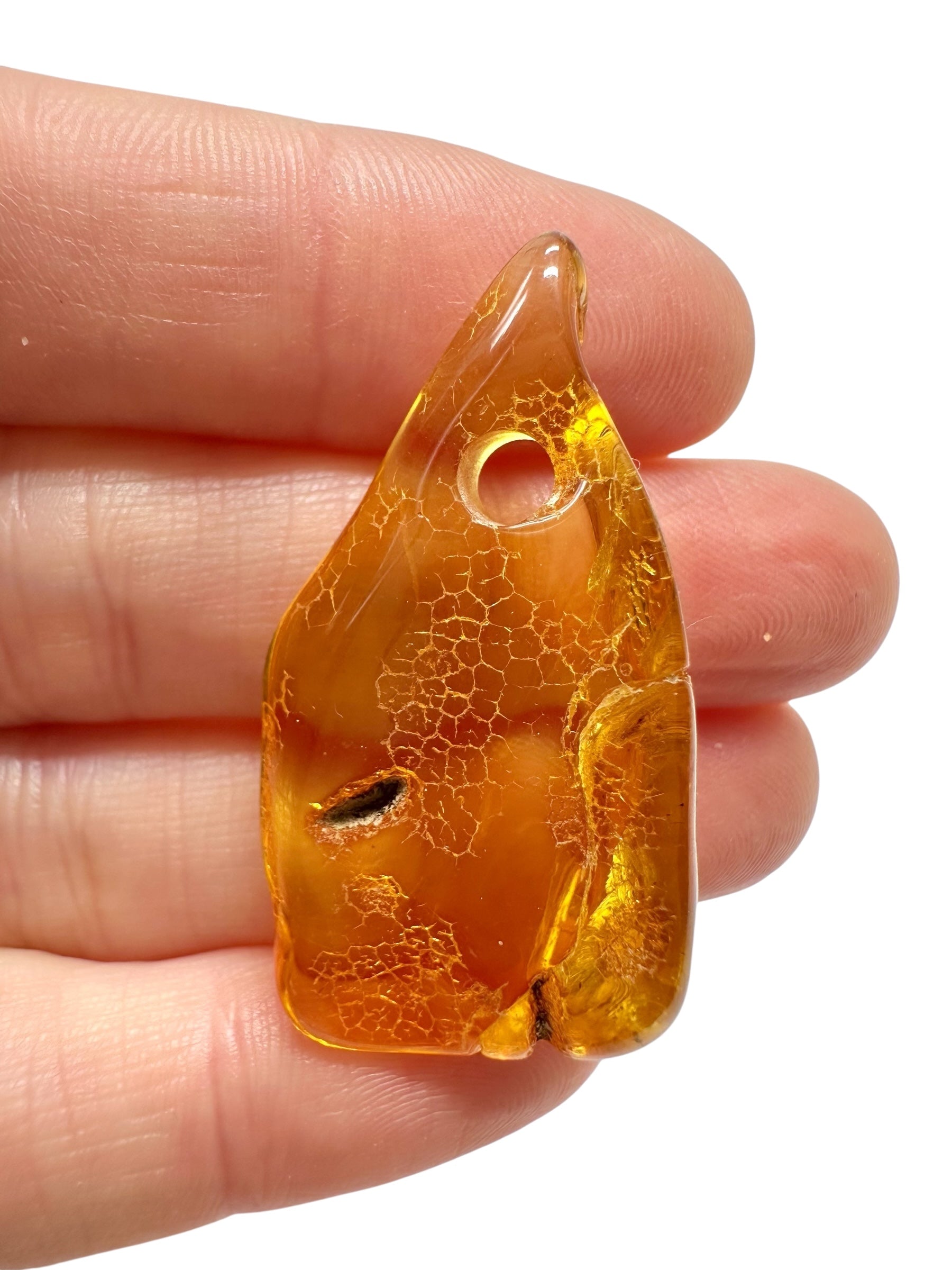 Amber with a drilled hole for hanging 2,8g – Lithuania - JND94