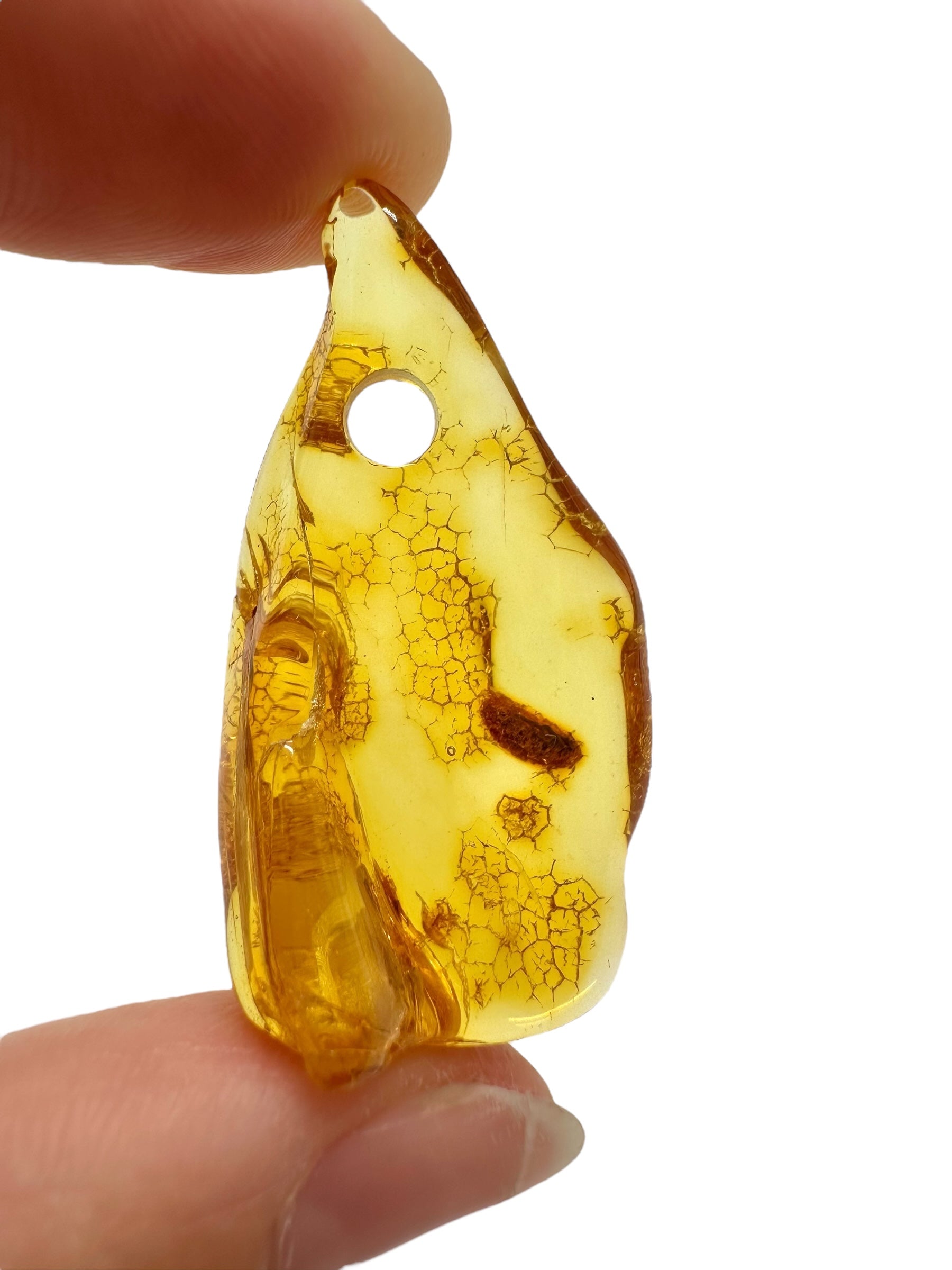 Amber with a drilled hole for hanging 2,8g – Lithuania - JND94