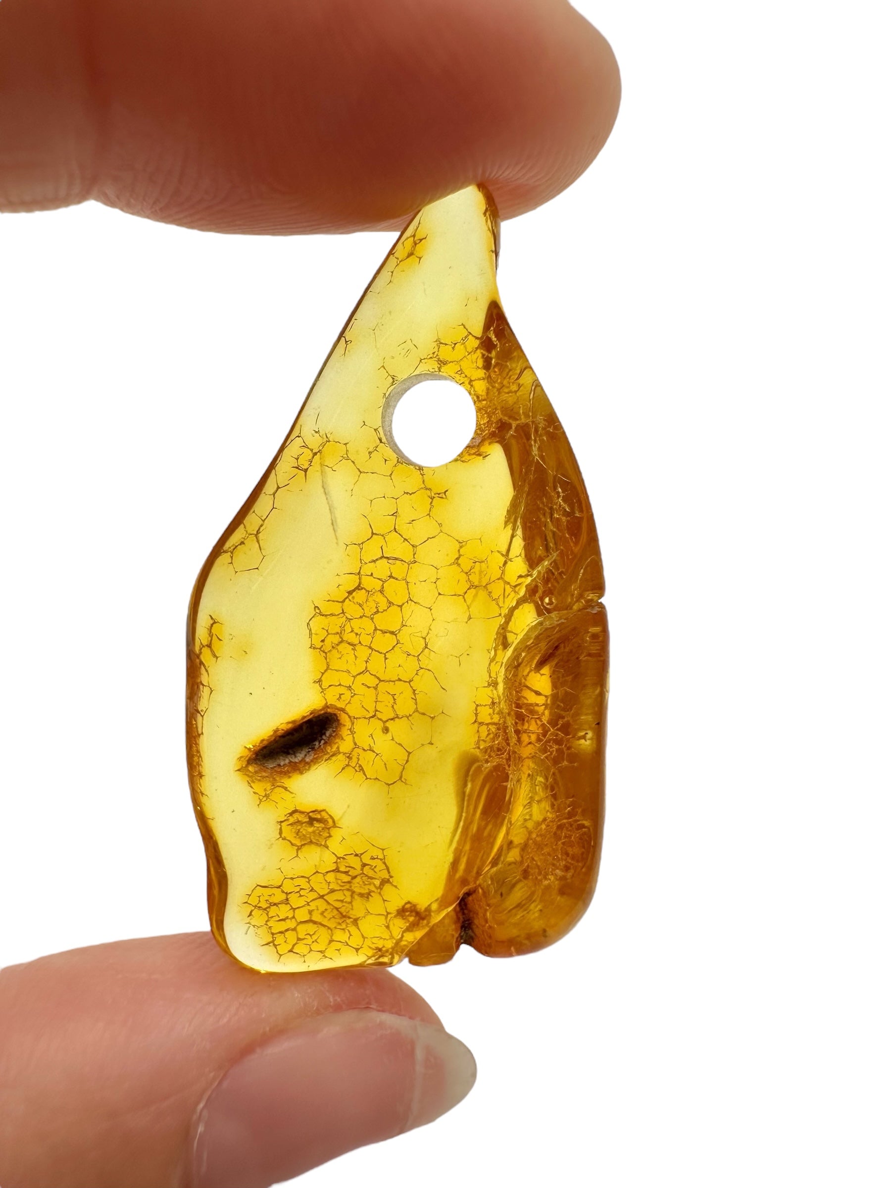 Amber with a drilled hole for hanging 2,8g – Lithuania - JND94