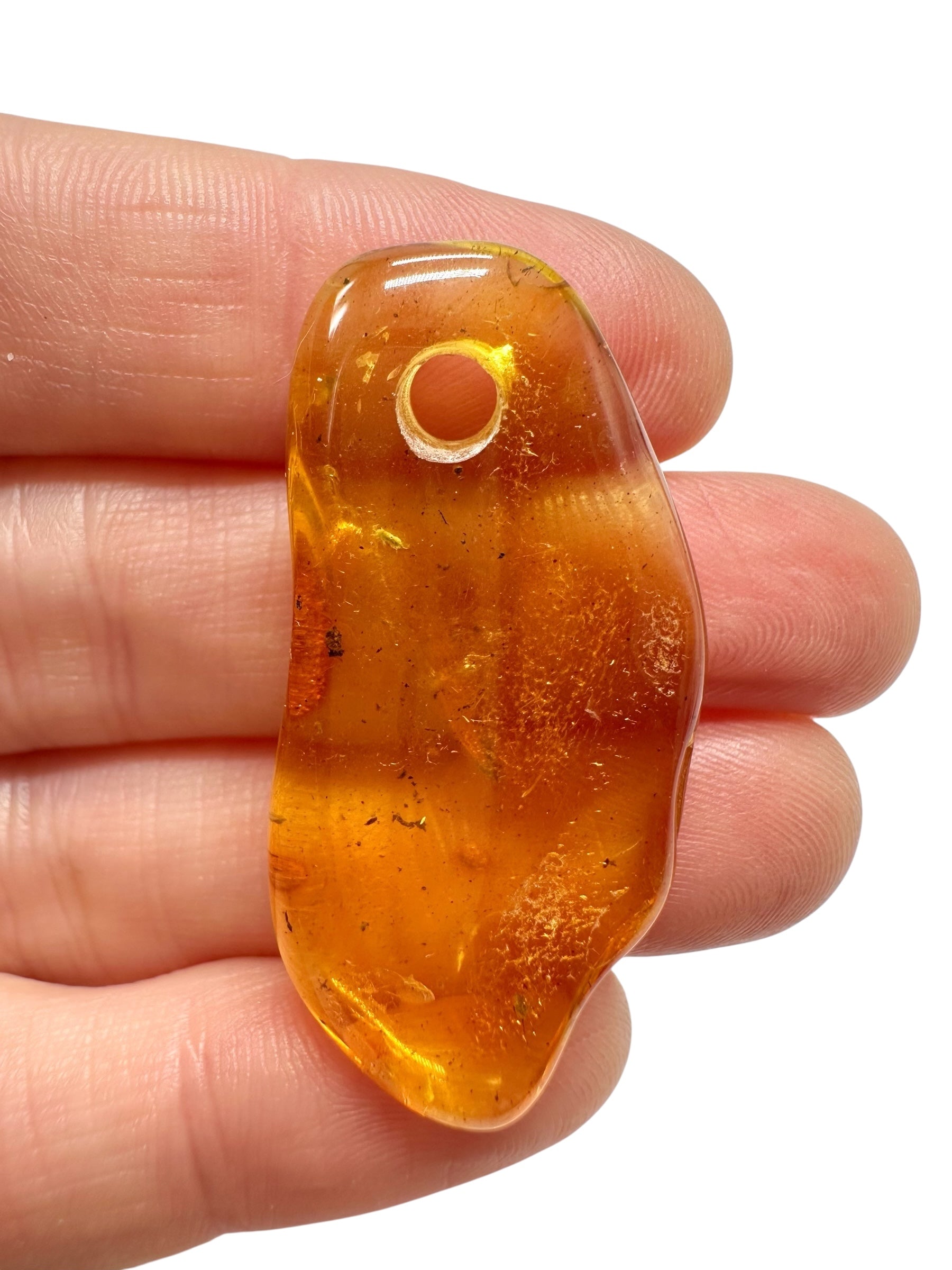 Amber with a drilled hole for hanging 3,3g – Lithuania