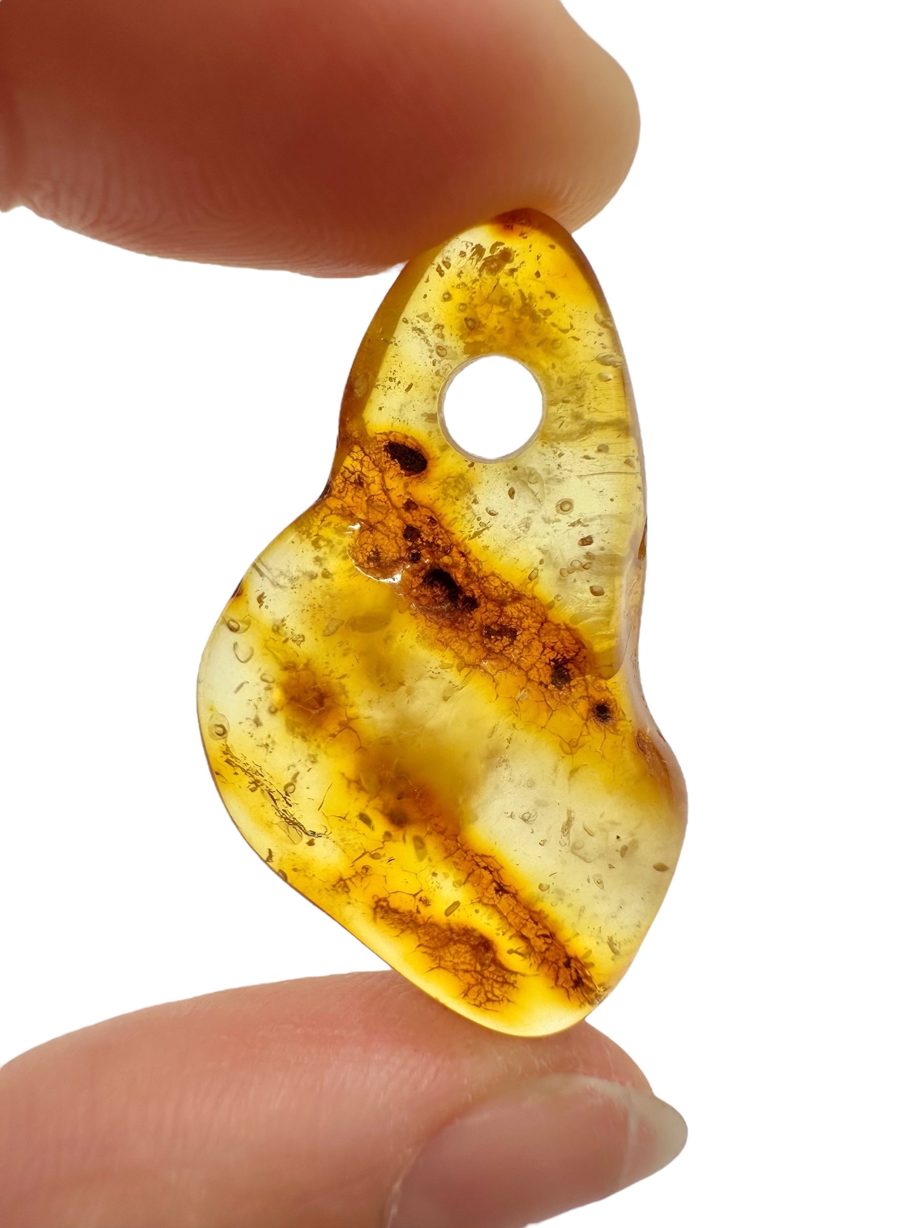 Amber with a drilled hole for hanging 2,3g – Lithuania - JND96