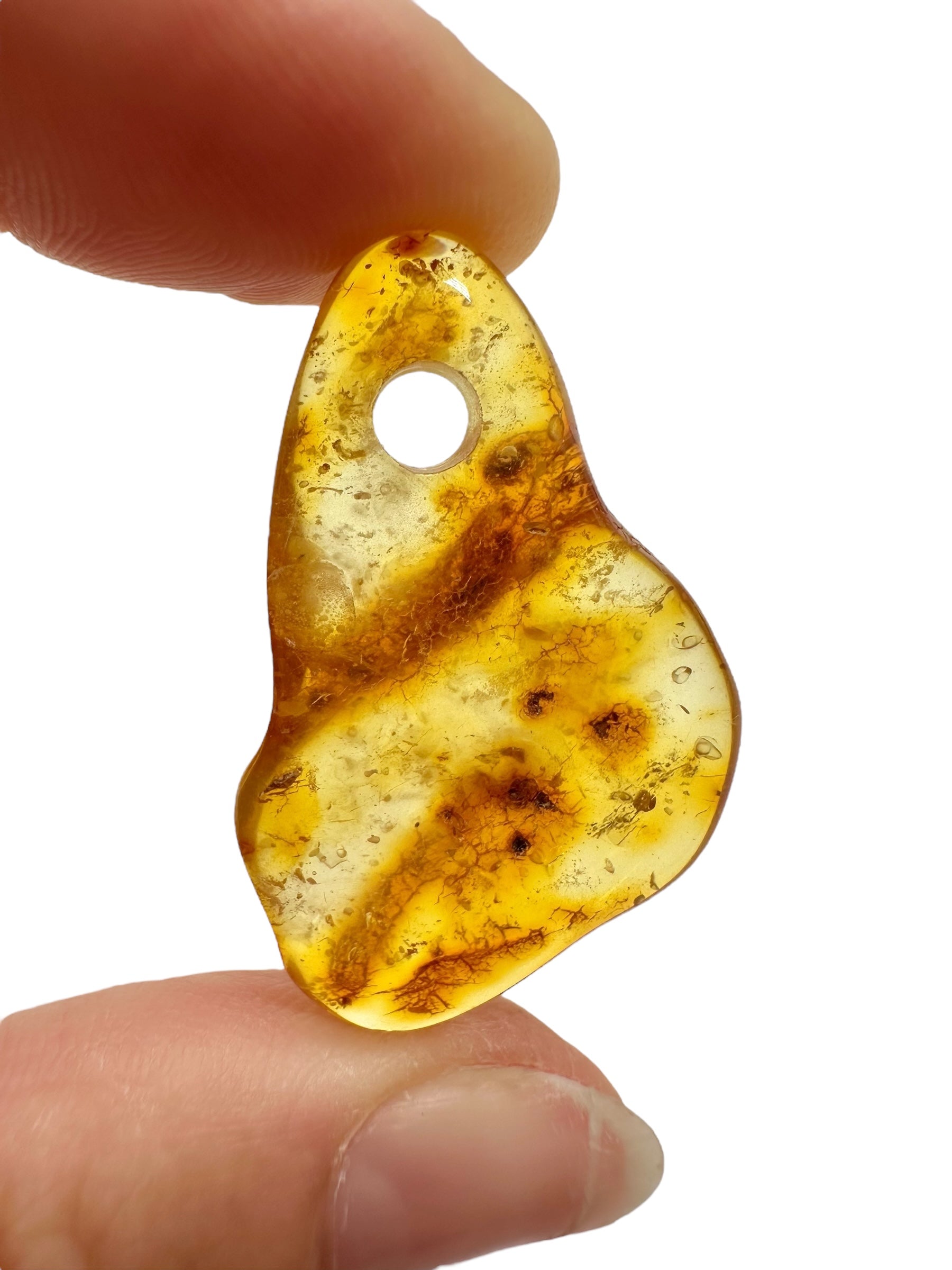 Amber with a drilled hole for hanging 2,3g – Lithuania - JND96