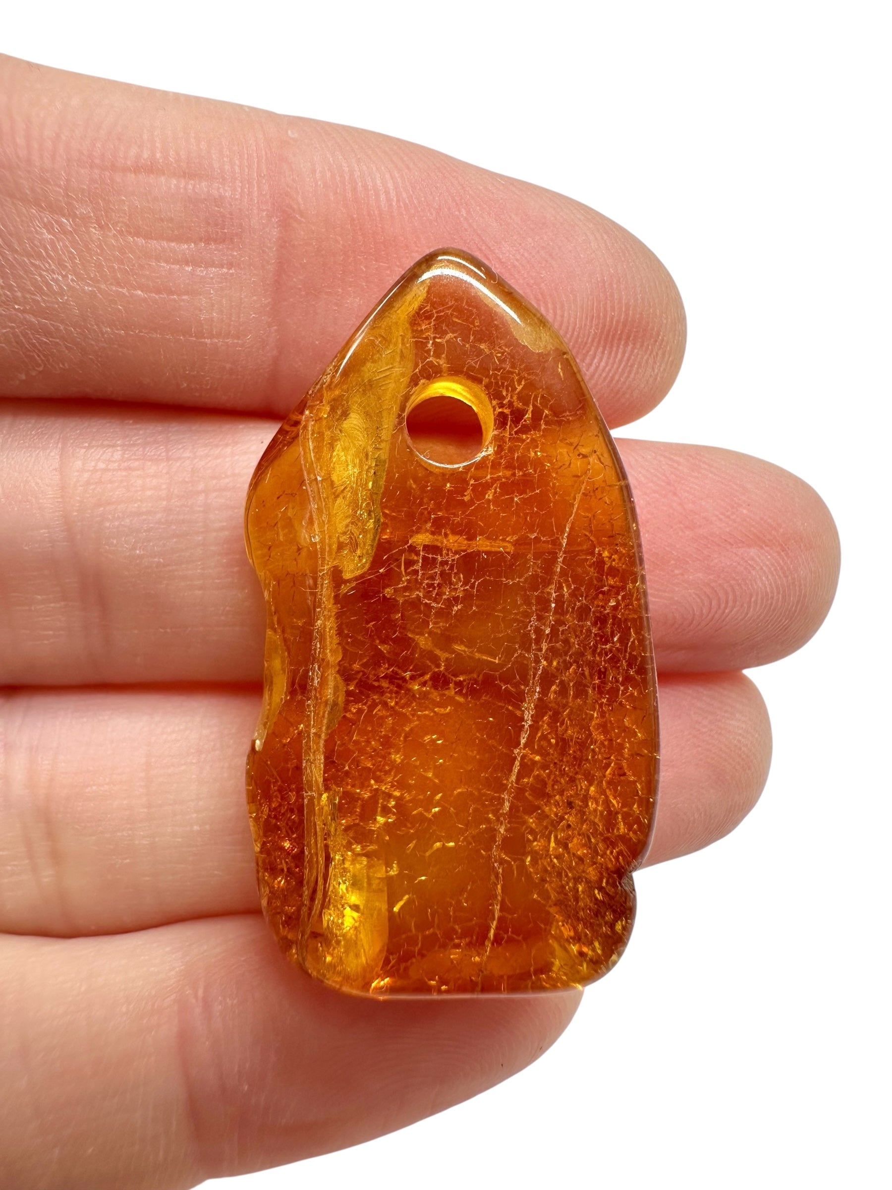 Amber with a drilled hole for hanging 2,7g – Lithuania - JND101