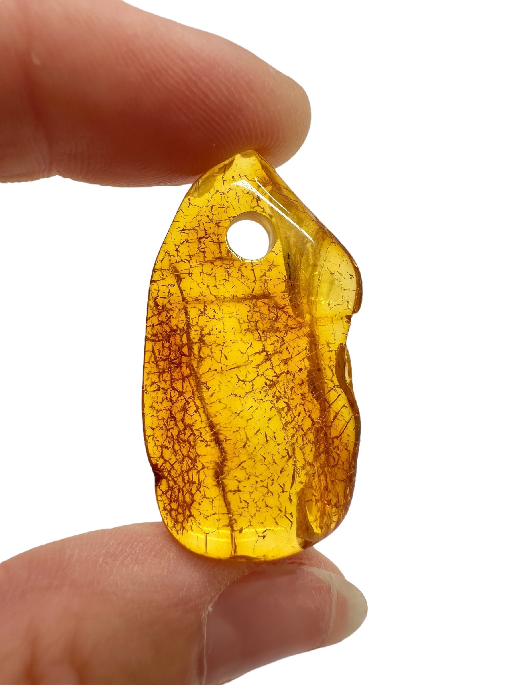 Amber with a drilled hole for hanging 2,7g – Lithuania - JND101
