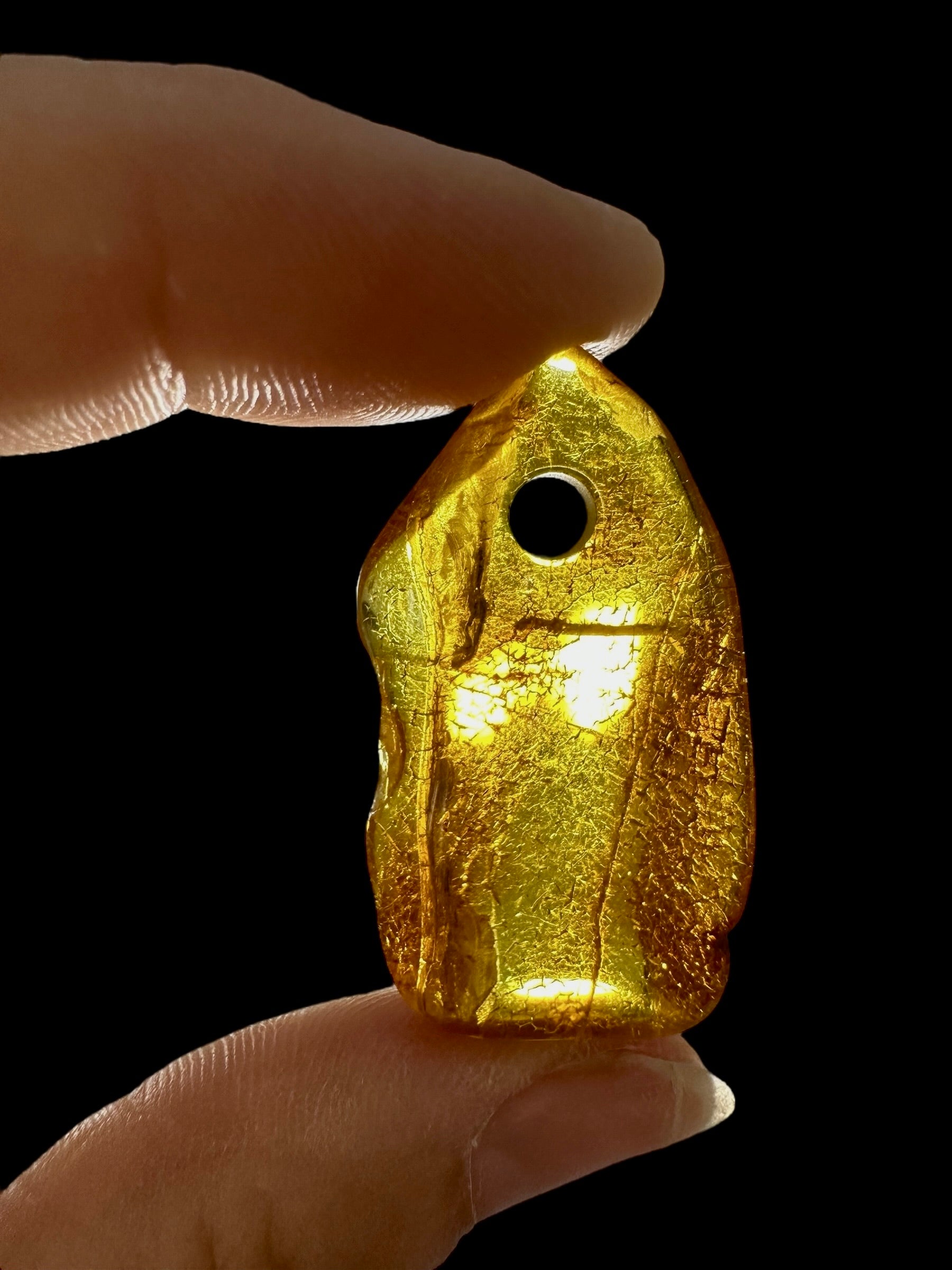 Amber with a drilled hole for hanging 2,7g – Lithuania - JND101