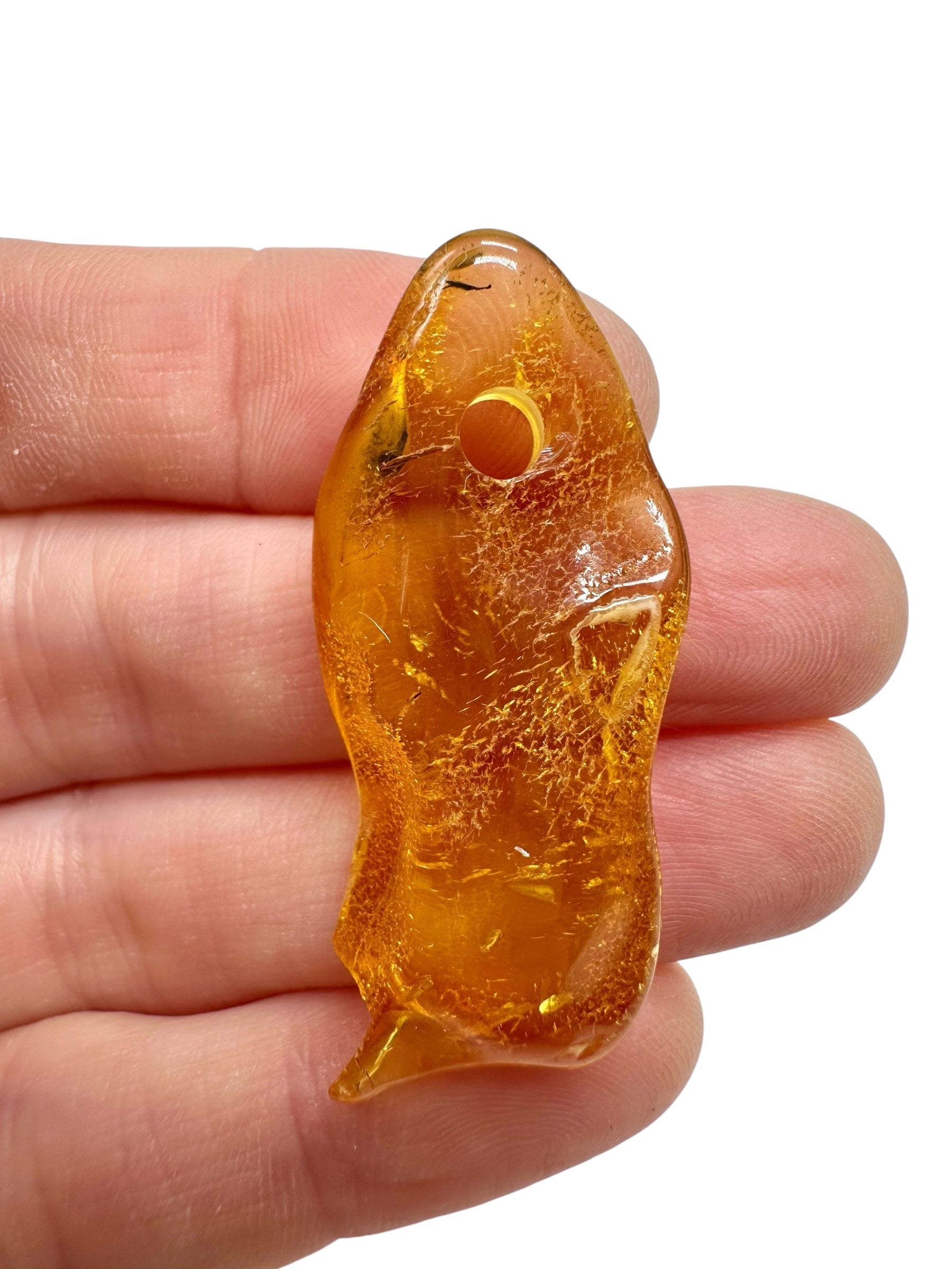 Amber with a drilled hole for hanging 2,5g – Lithuania