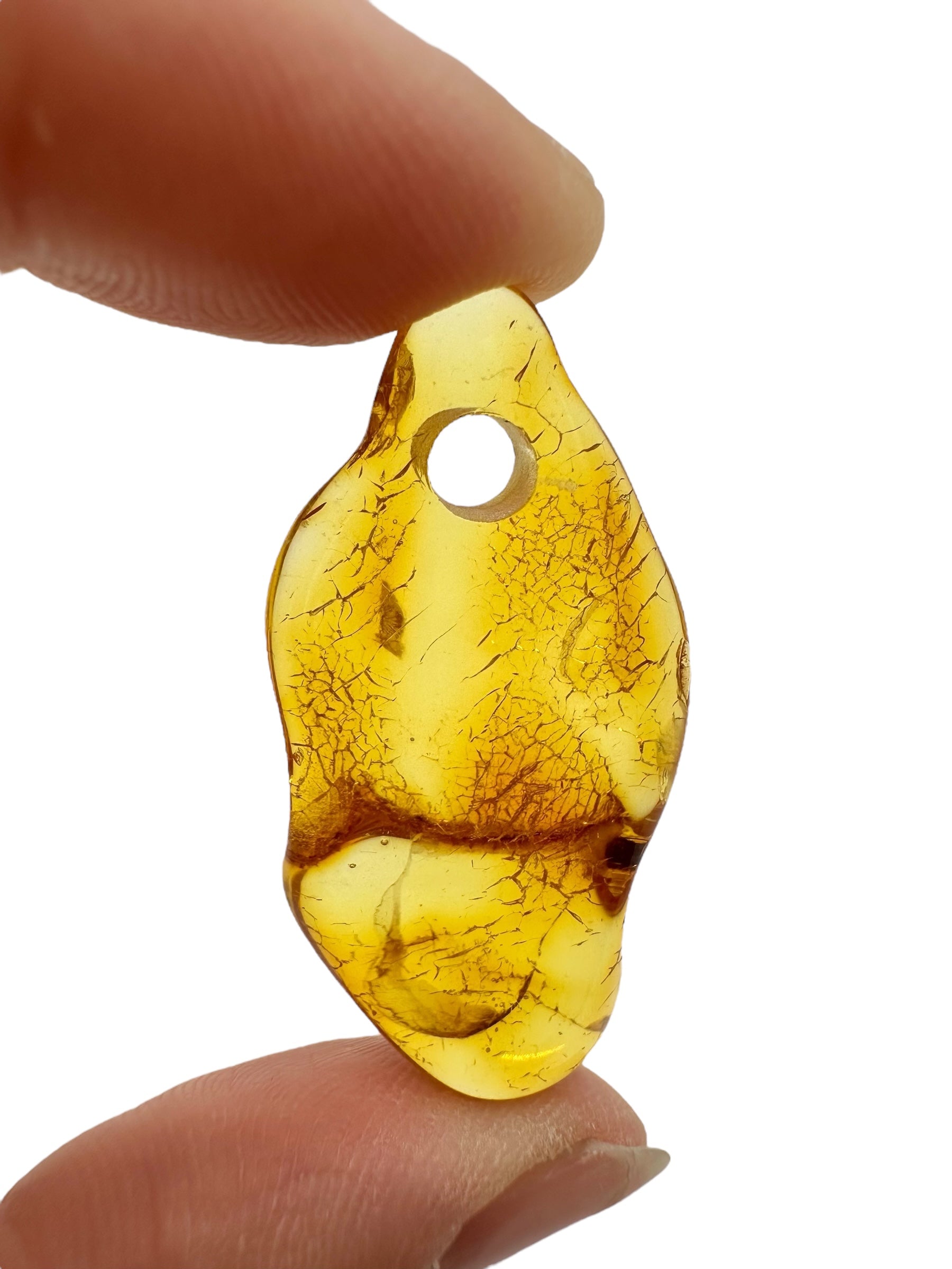 Amber with a drilled hole for hanging 2,2g – Lithuania - JND103