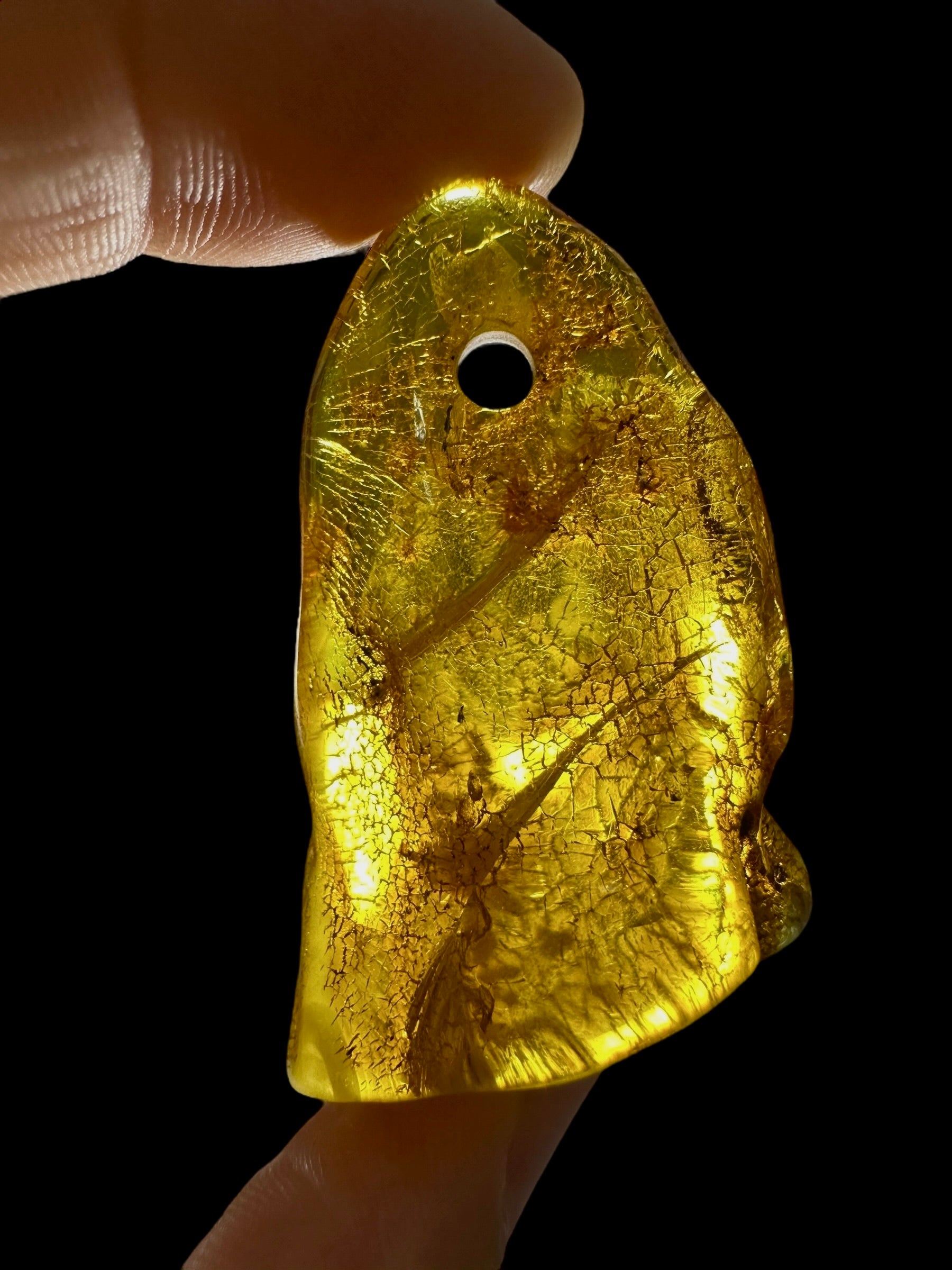 Amber with a drilled hole for hanging 8,4g – Lithuania - JND109
