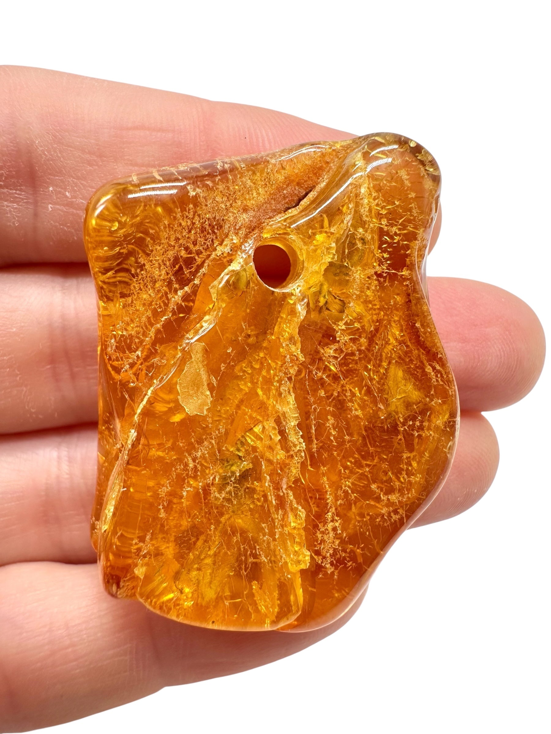 Amber with a drilled hole for hanging 10g – Lithuania