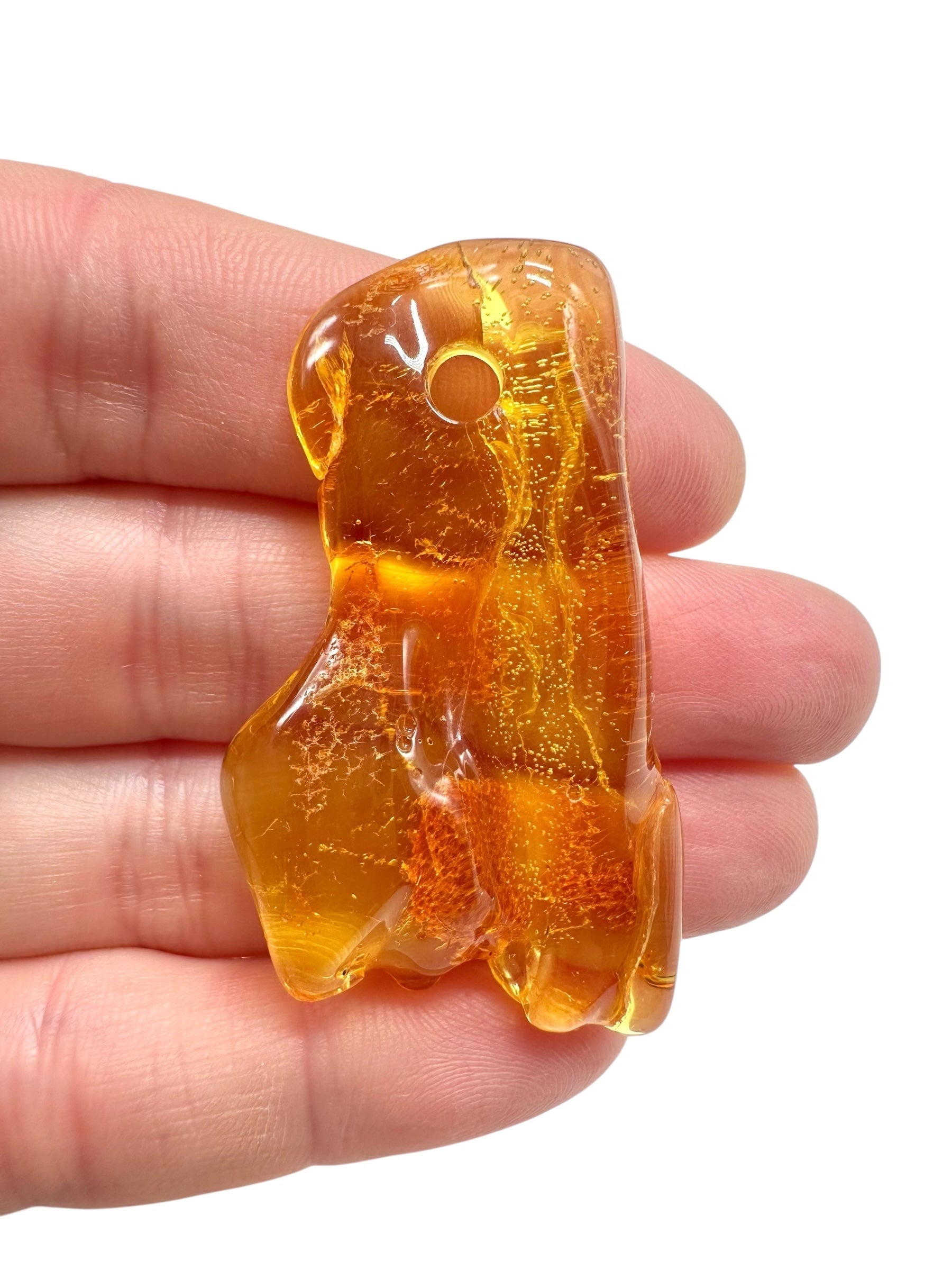 Amber with a drilled hole for hanging 5g – Lithuania