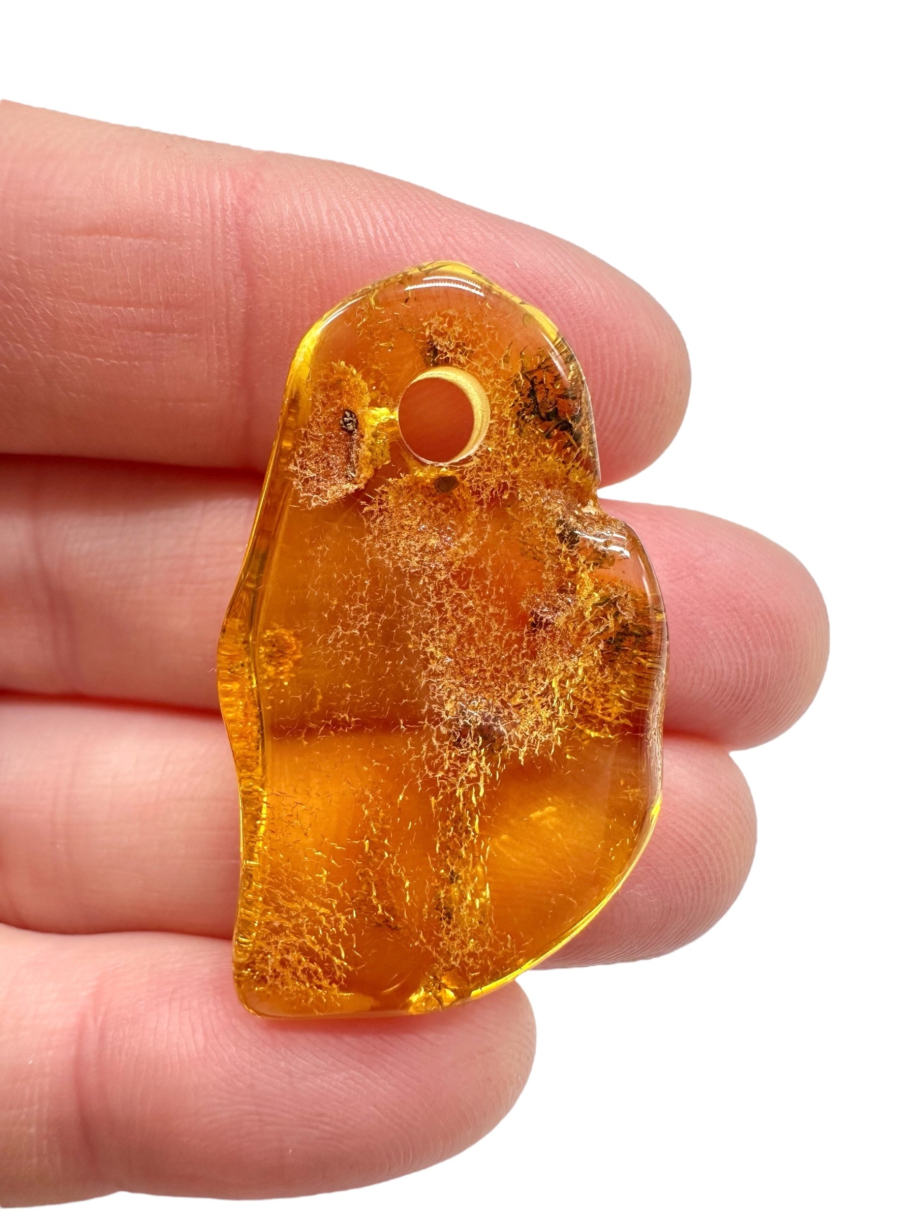 Amber with a drilled hole for hanging 2,5g – Lithuania - JND119