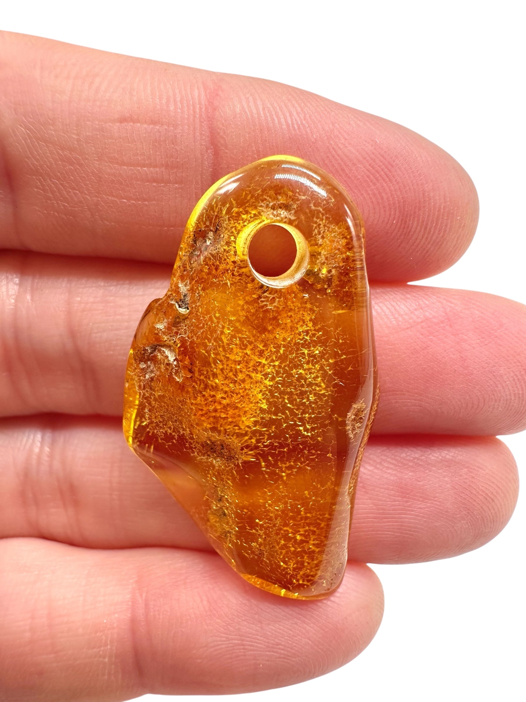 Amber with a drilled hole for hanging 2,5g – Lithuania